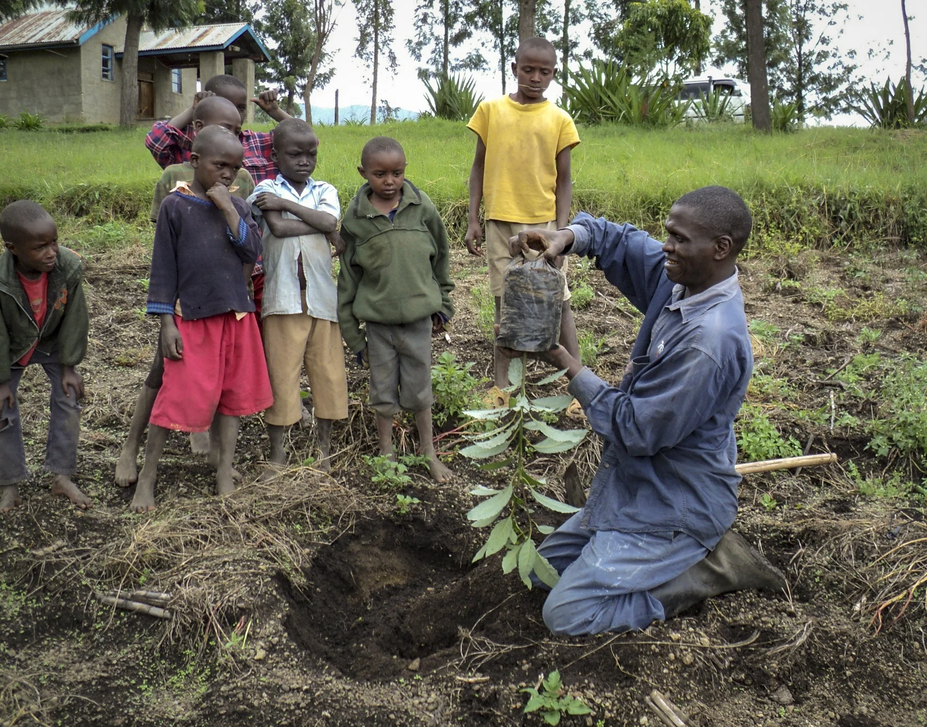Jopsaht demonstrates how to plant a tree seedling-1.jpg