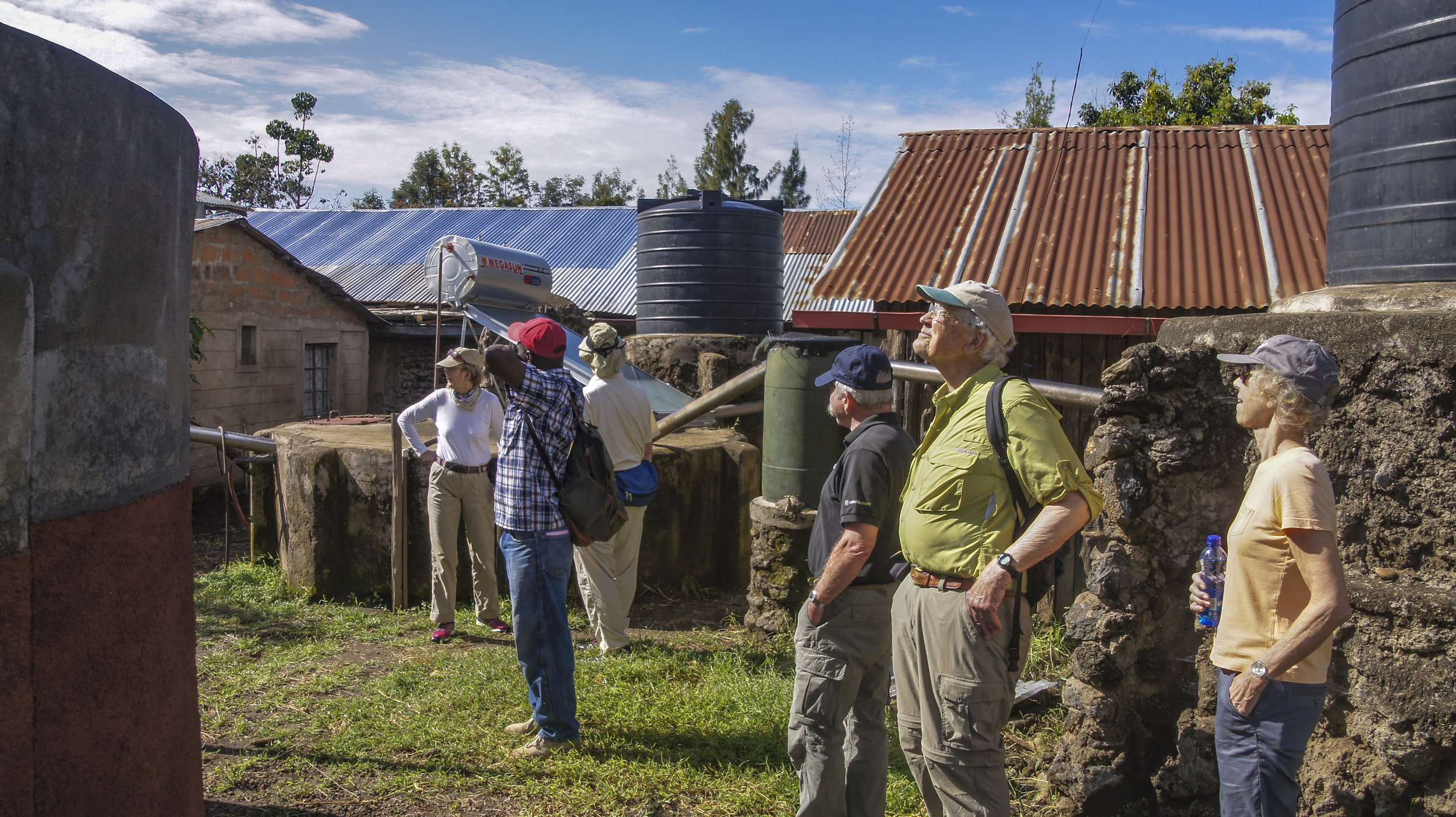 Friends of NECC view the completed solar hot water system