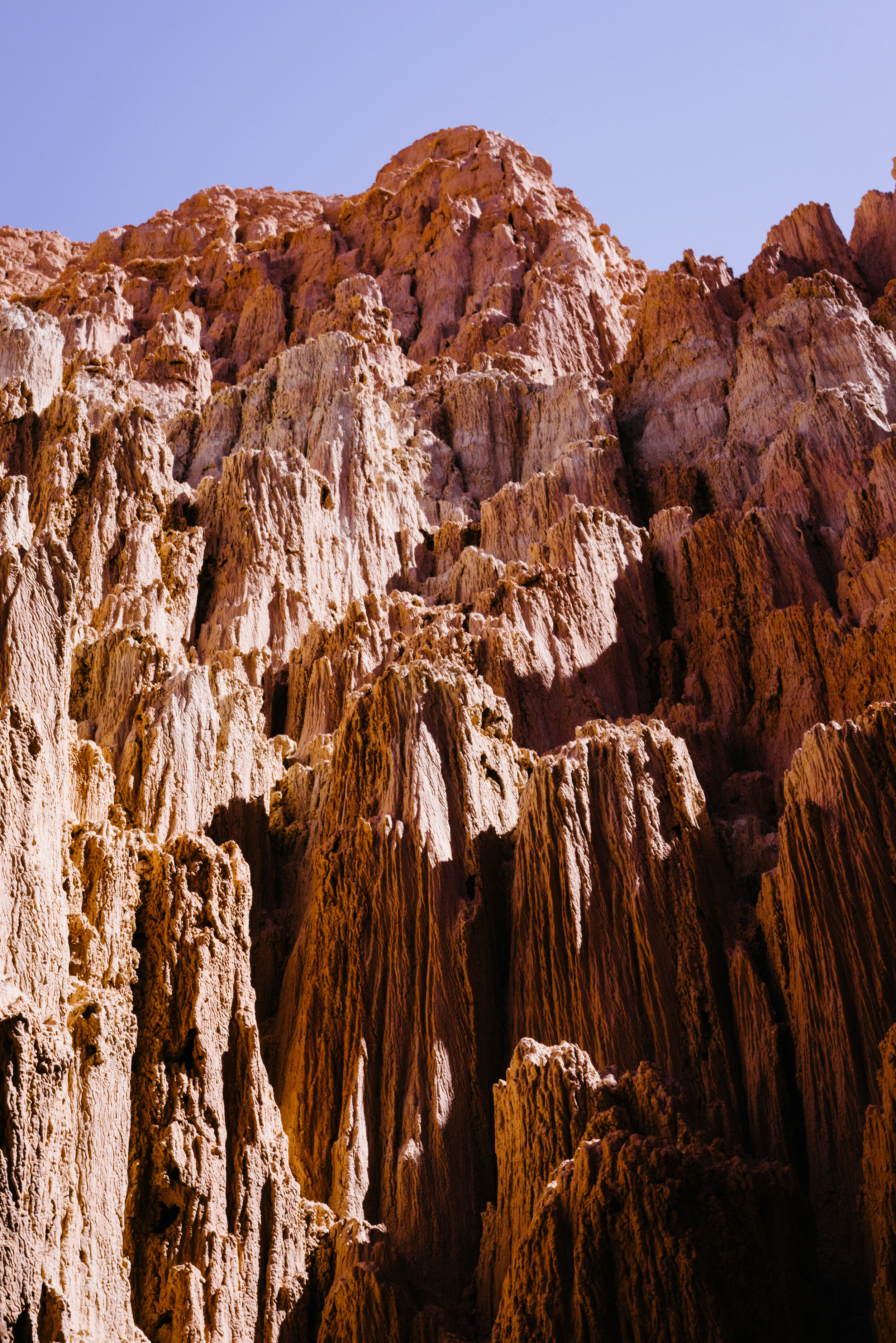 Caused by volcanic ash mixed with other regional sediment, this unique clay erodes with the rain leaving breathtaking structures behind.