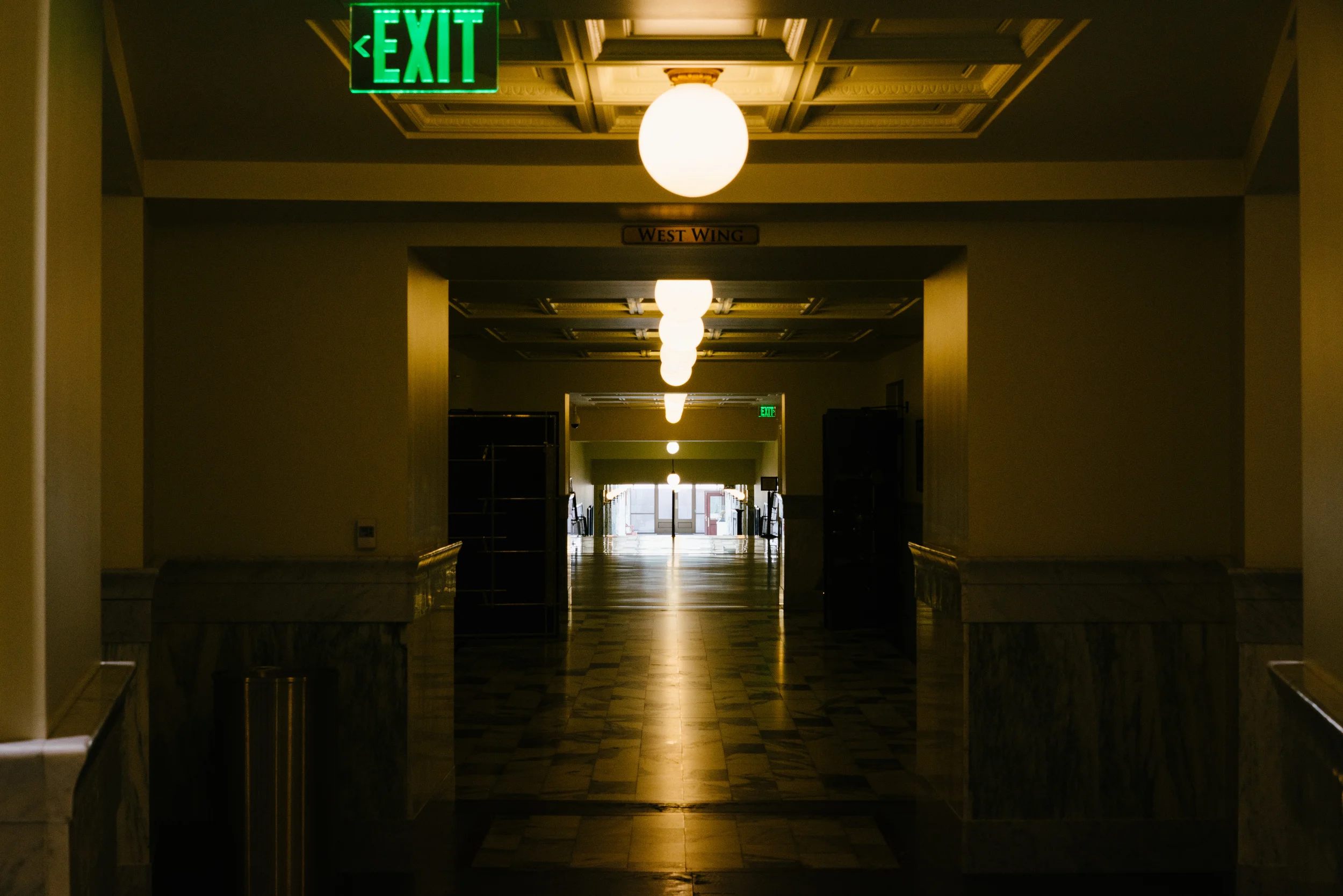The basement levels stretch out in both wings to empty halls.