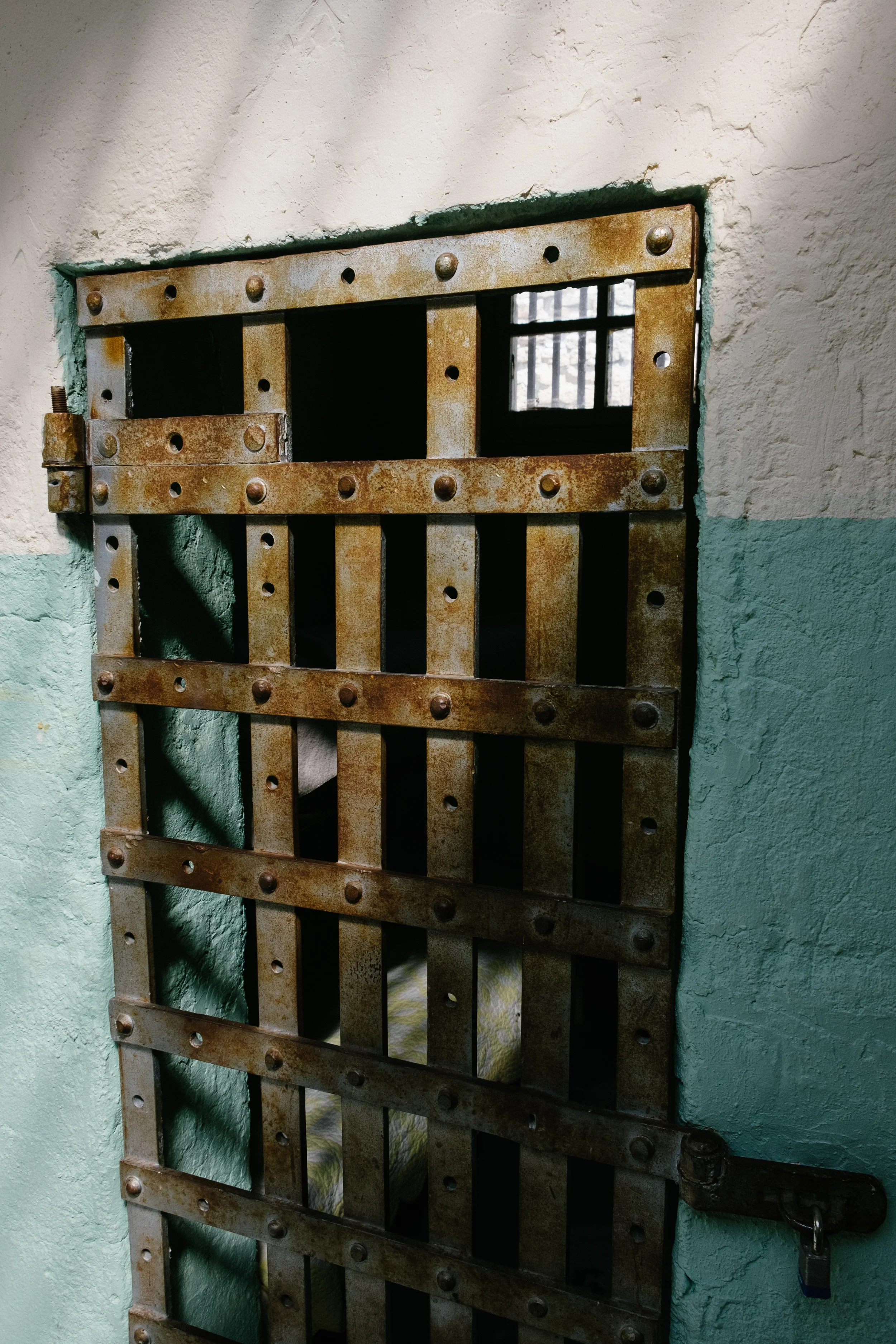 Cell doors in the old Woman's Ward are flat works of iron riveted together.