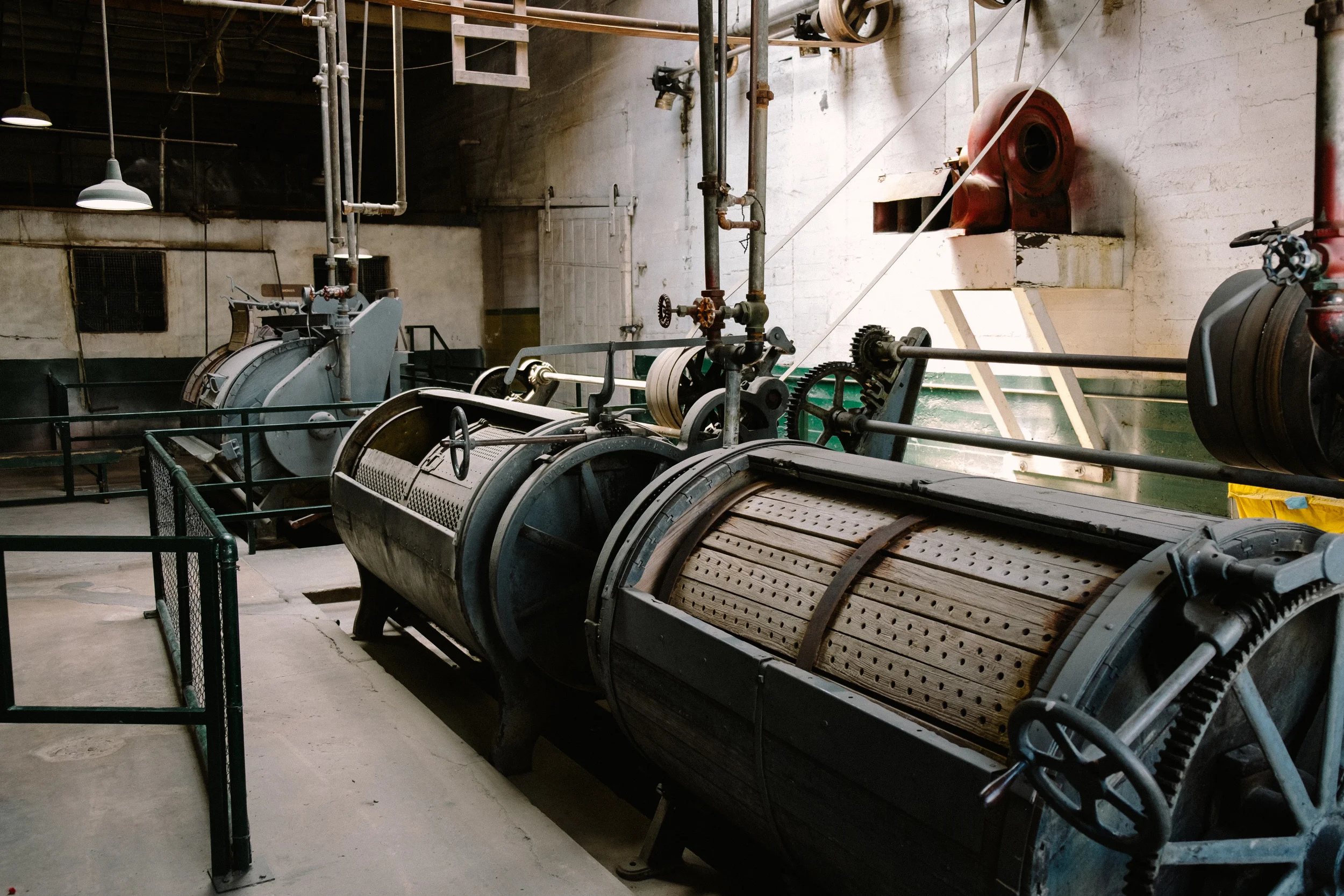The laundry and shower facilities are open and much of the original equipment remains.