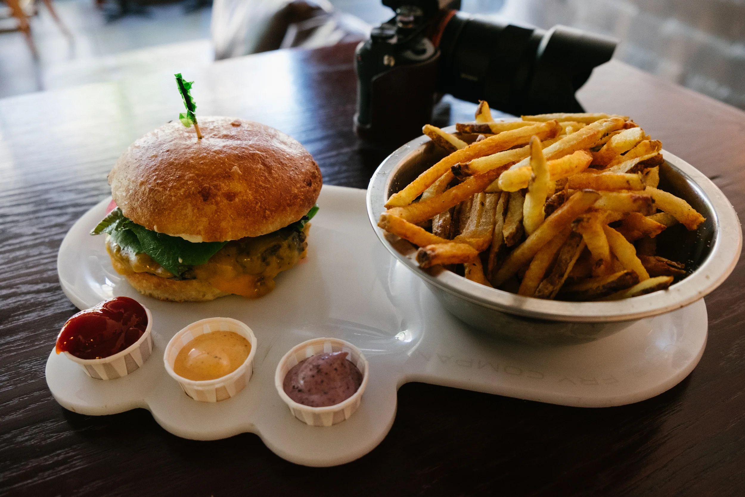 A wonderful quinoa veggie burger with russet fries. House made ketchup, chipotle sauce, and blueberry ketchup to dip into. 