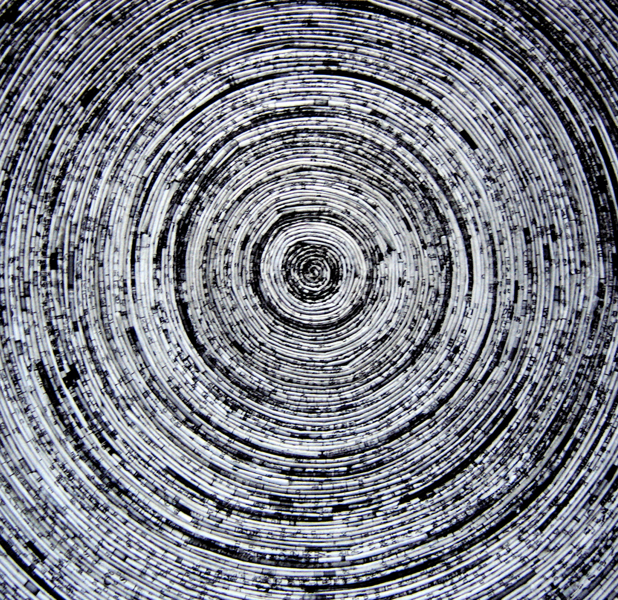 1. Coiled newsprint.png