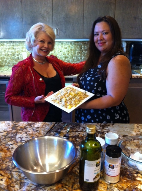 Host Kathy Garver with guest Veronica and her wok-cooked chicken and rice.