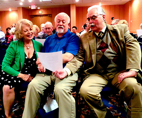 Kathy sings the farewell song with Don Ranbow the director and Michael Helms actor and producer.