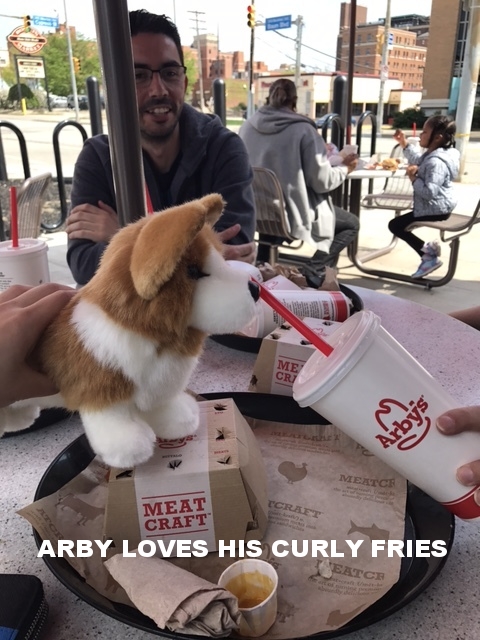 Arby loves his curly fries.jpg