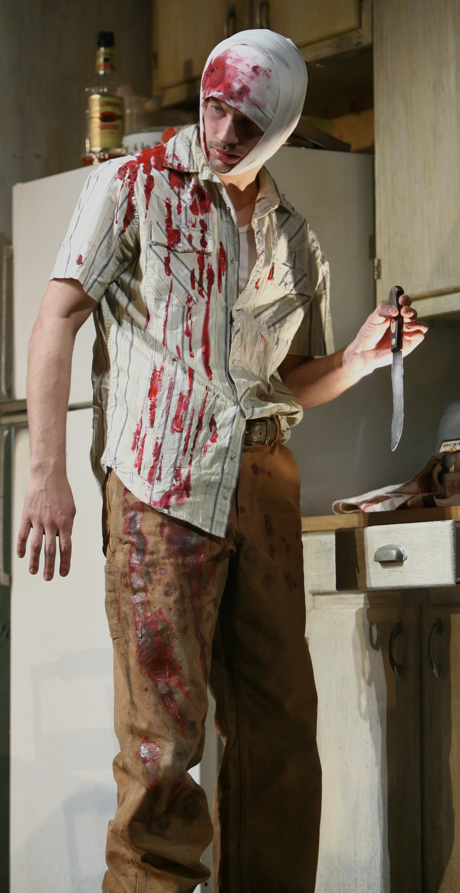 Logan bloody w: knife.JPG