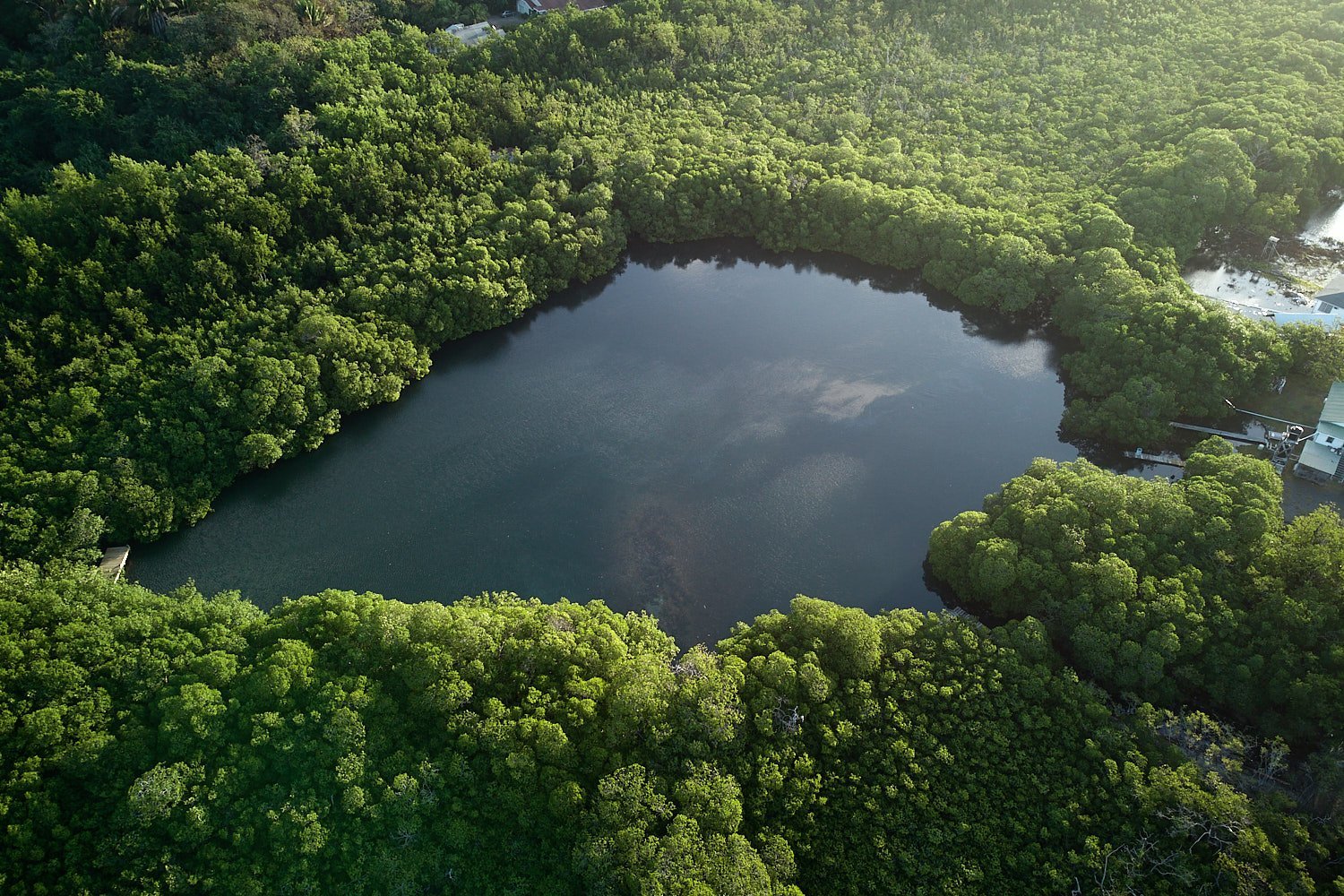 Dron aerial photography of lagoon at Roatan, Honduras - Destination photo for Terra Chula Resort in Roatan, Honduras_JiriLizler_Hospitality Photographer.jpg