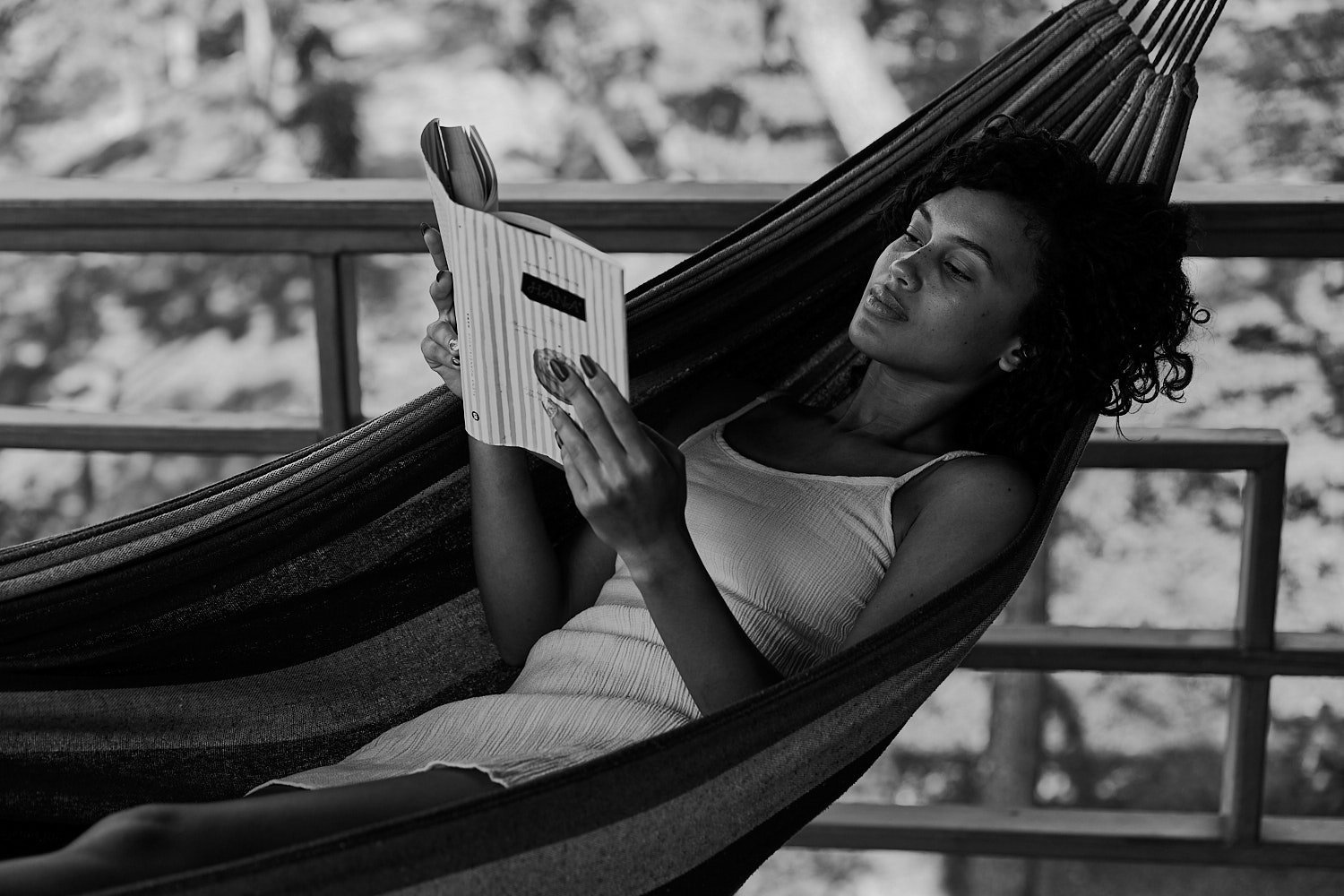 lifestyle photography of Terra Chula Resort in Roatan, Honduras - Women with book in balck and white_JiriLizler_Hotel Photographer.jpg