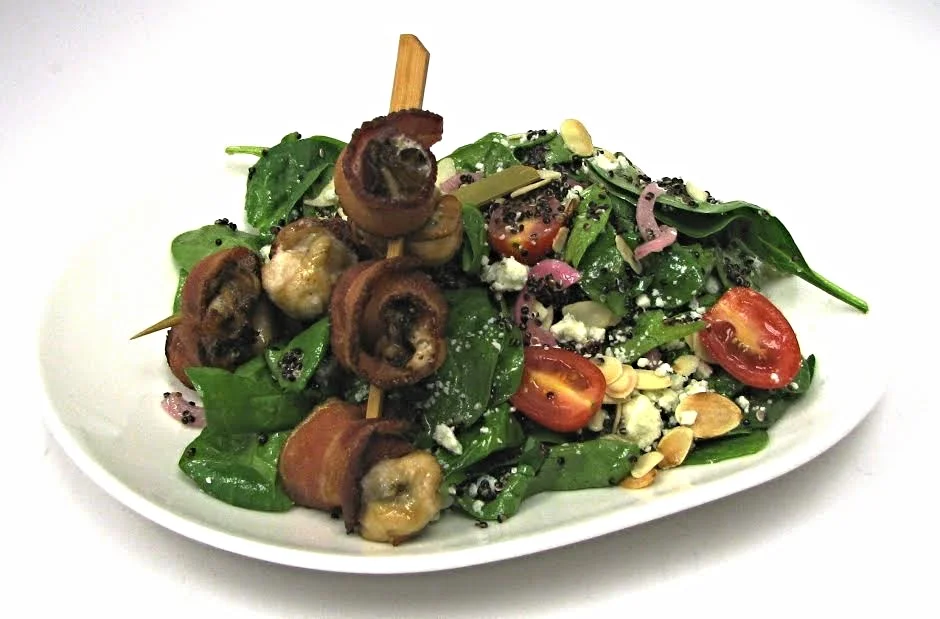 Bacon Wrapped Oysters (spinach salad, black quinoa, pickled red onion, creole mustard vinaigrette)