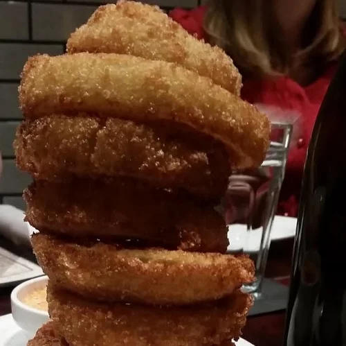 Tower of thick cut panko Onion Rings 