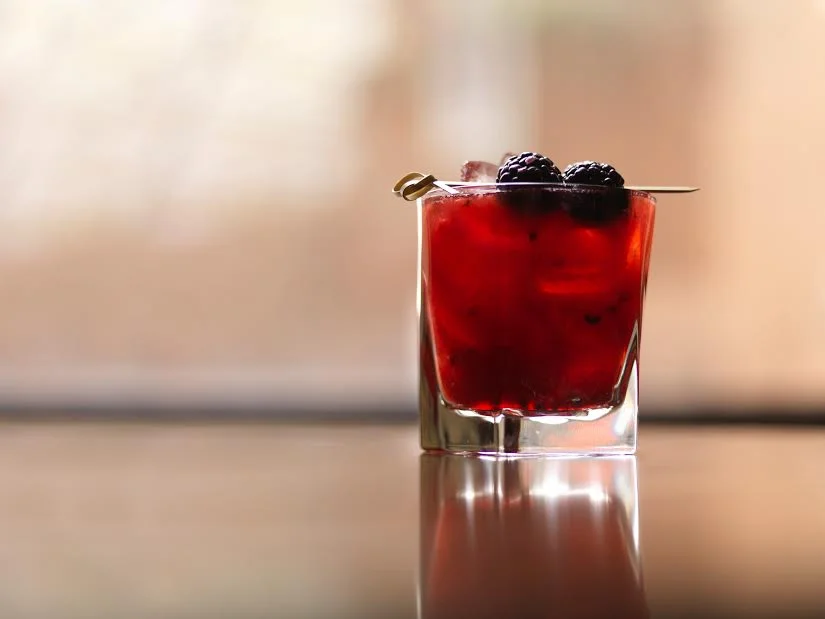 Black Sapphire starts with crushed blackberries that are then mixed with yuzu, Domaine de Canton Ginger and Bombay Sapphire.