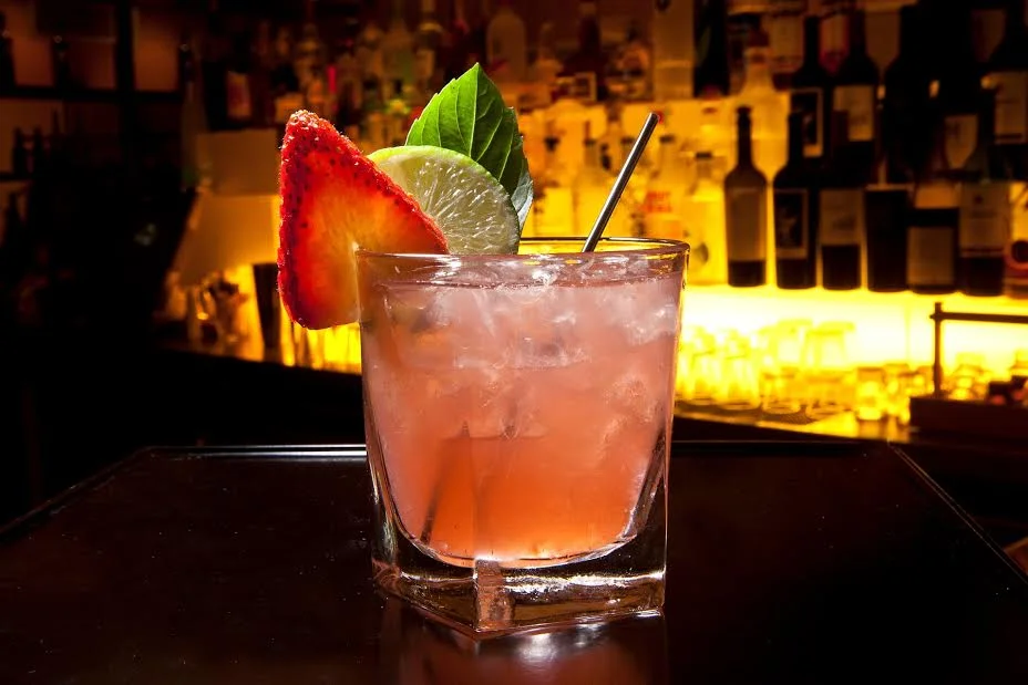 Strawberry Margarita is a fruit-laced twist on the classic cocktail that marries Avión tequila with agave nectar, fresh strawberries and basil.