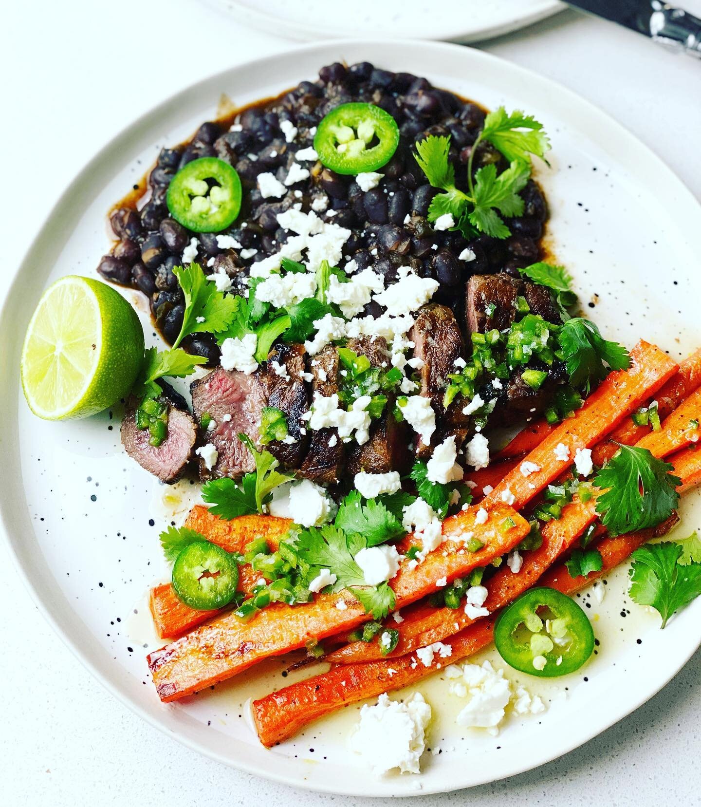 Jalape&ntilde;o lime steak with roasted carrots &amp; black beans 
.
Full of delicious Mexican flavors, this dinner packs in the nutrients and comes together quickly. Bookmark this one if your looking to try a new sheet pan dinner with all these fres