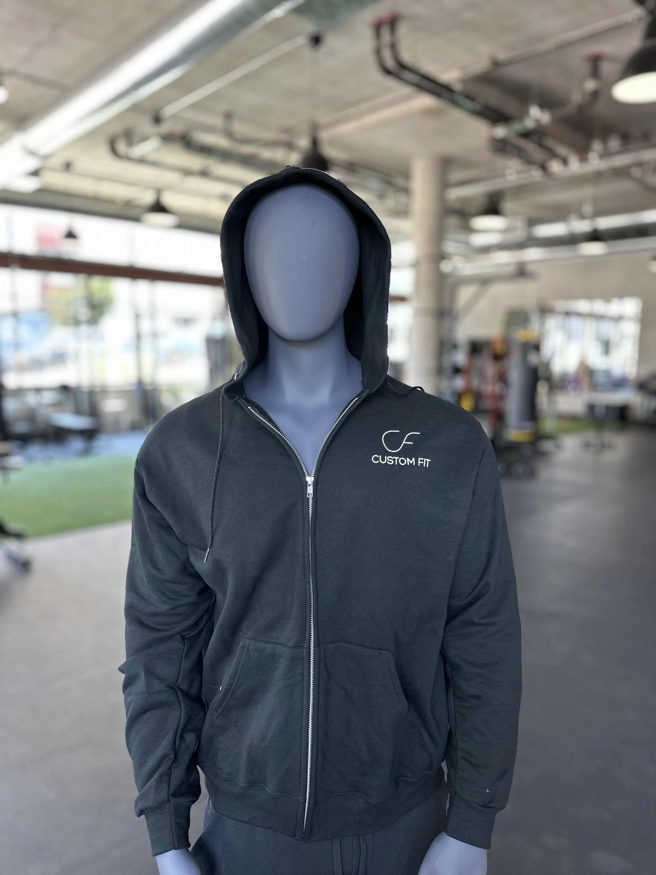 Champion Branded Zip-Up Hoodie.  Black color with white CF logo on chest