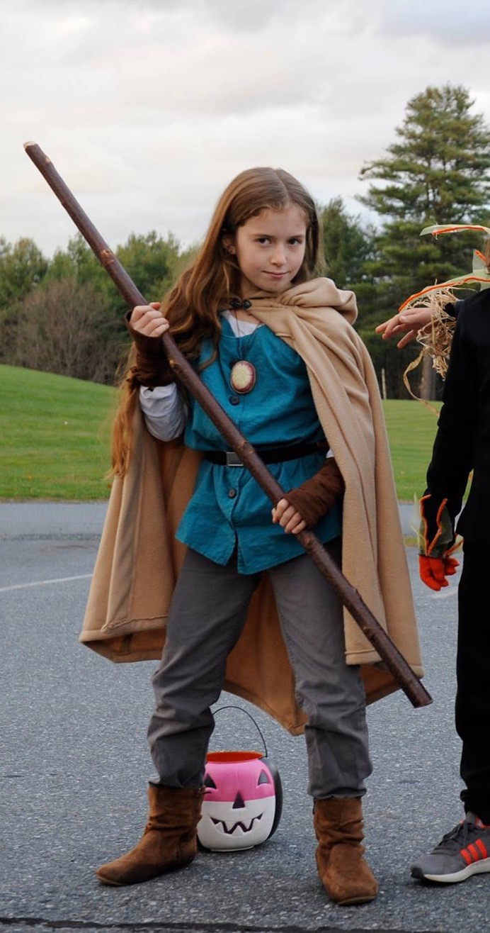  I freehanded a cape from fleece, a teal tunic and microsuede hand wraps. She had a red birch staff. 