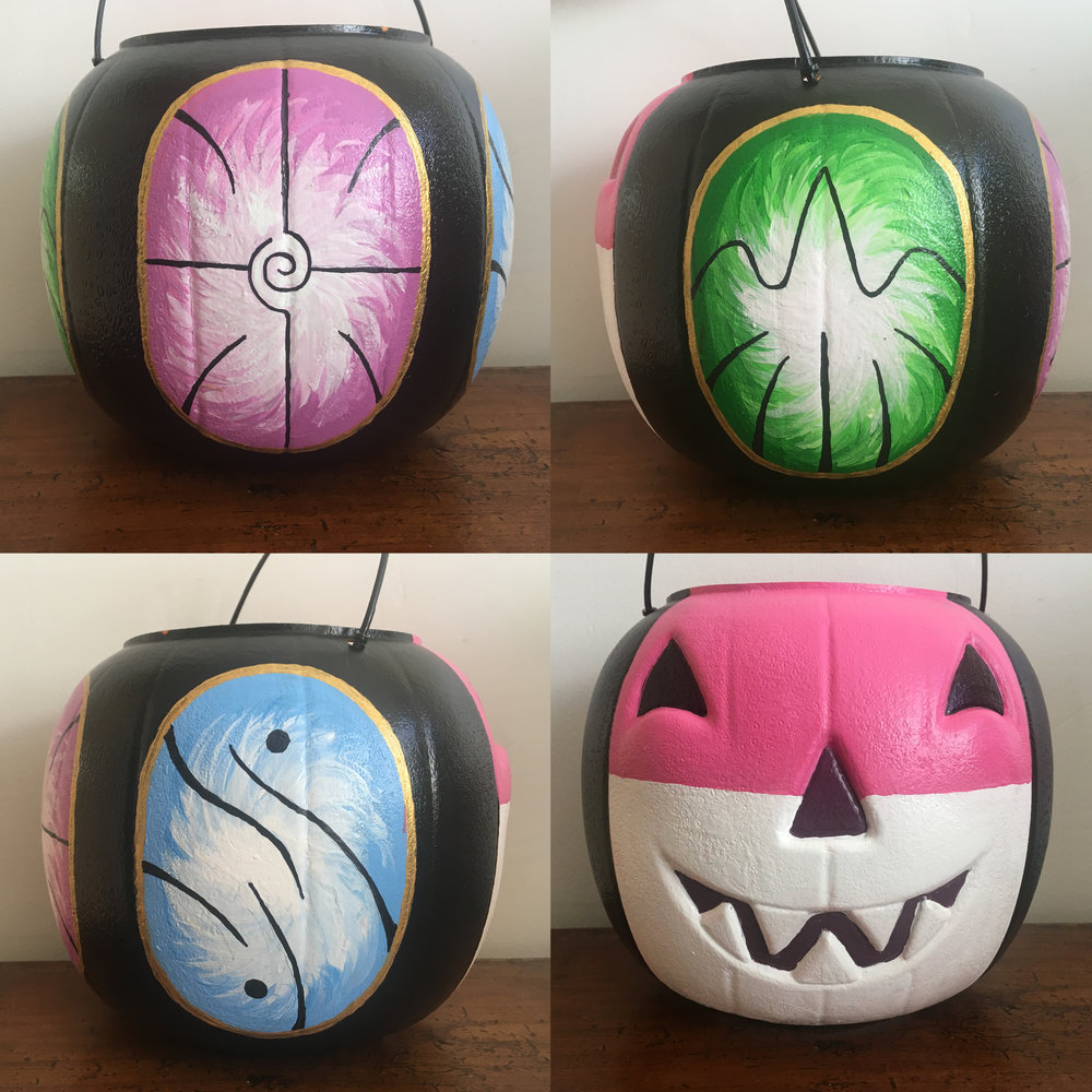  As her candy pumpkin couldn’t go ignored, I put three of the more important amulets from the book series on three sides of it and turned its face into Miskit, Emily’s rabbit sidekick. 