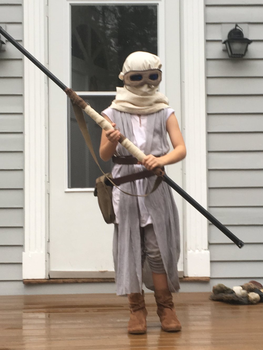 She kept the desert headgear on because it was cold and rainy that year, more like Endor than Jakku. 