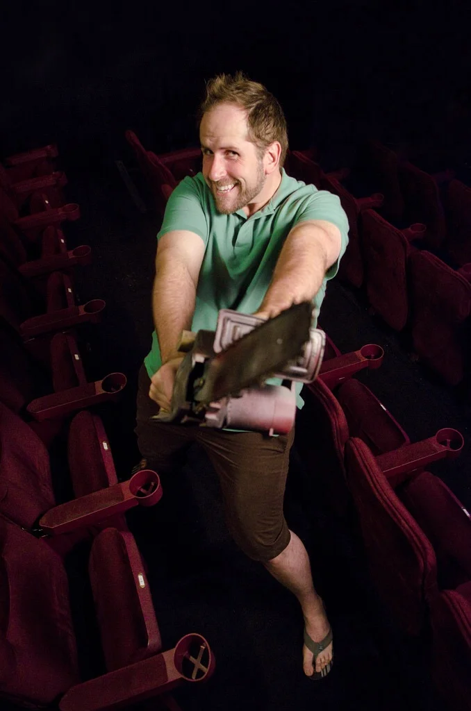 Troy Heard of the Onyx Theatre poses with his chainsaw.