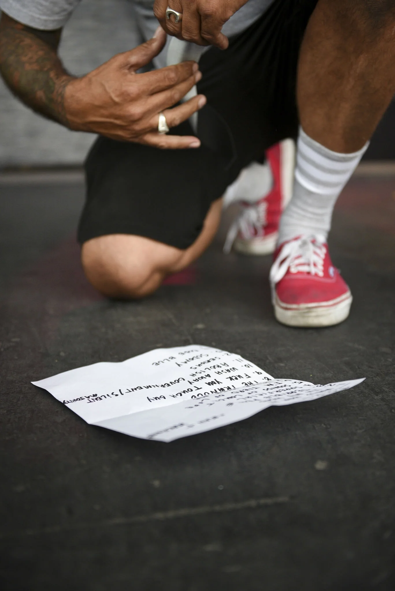 A stagehand sets up TSOL's set list at Punk Rock Bowling in downtown Las Vegas, Nevada.