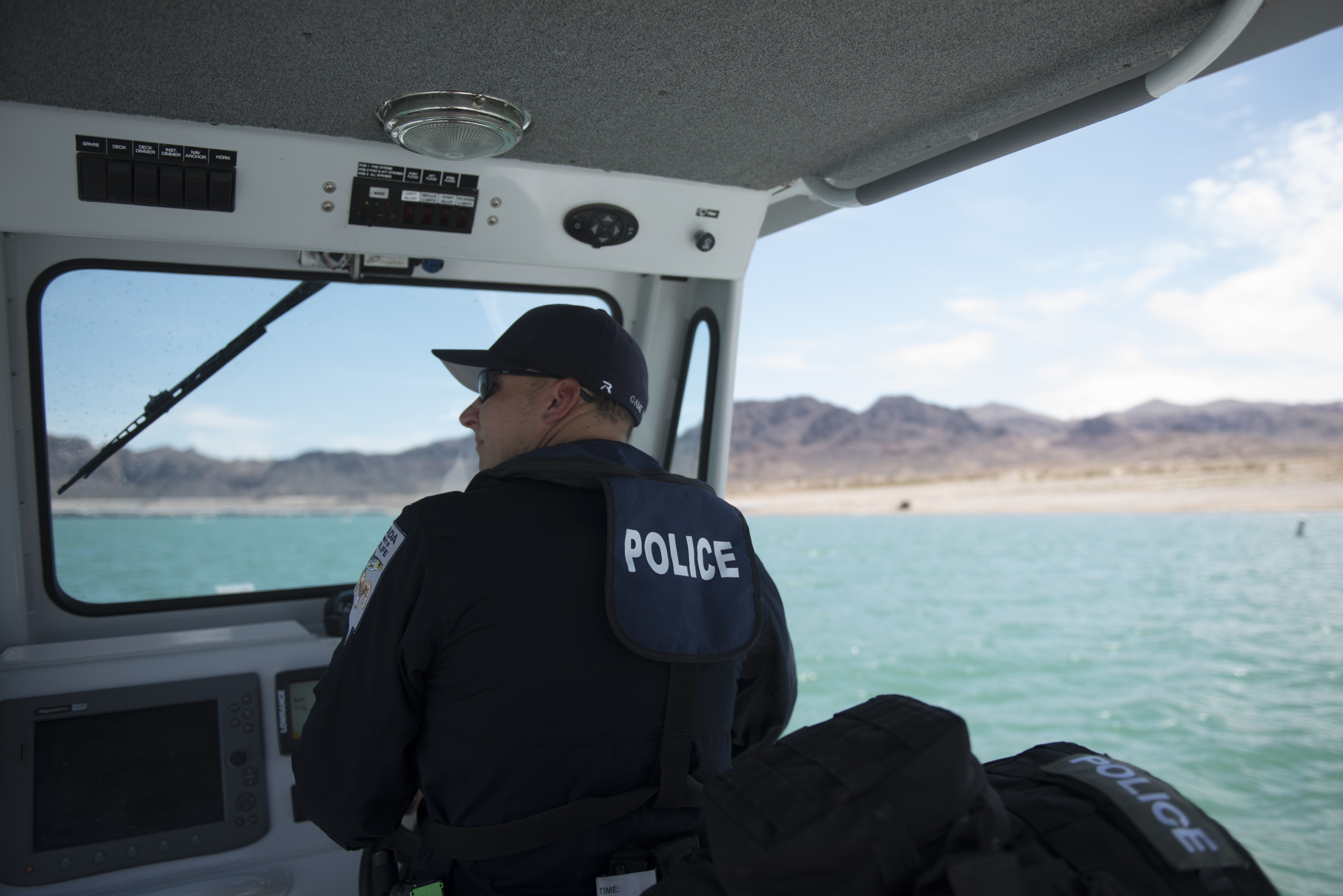 Zach Blackwood, game warden/police officer with the Nevada Department of Wildlife, gives a tour showing Lake Mead's receding waterline and the dangers it poses to boaters in Boulder City, Friday, July 3, 2015.(Jason Ogulnik/Las Vegas Review-Journal)