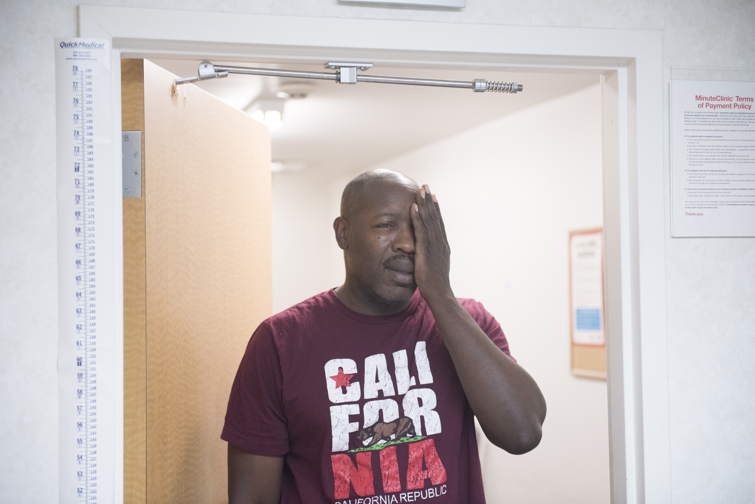 Anthony Howard has his eyesight checked by nurse practitioner Yvette Alto-Buenaflor at CVS Pharmacy's Minute Clinic at 1825 East Warm Springs Road in Las Vegas, Thursday, Aug. 13, 2015. Howard visits the clinic to have a physical for a driving position with the Department of Transportation. (Jason Ogulnik/Las Vegas Review-Journal) 