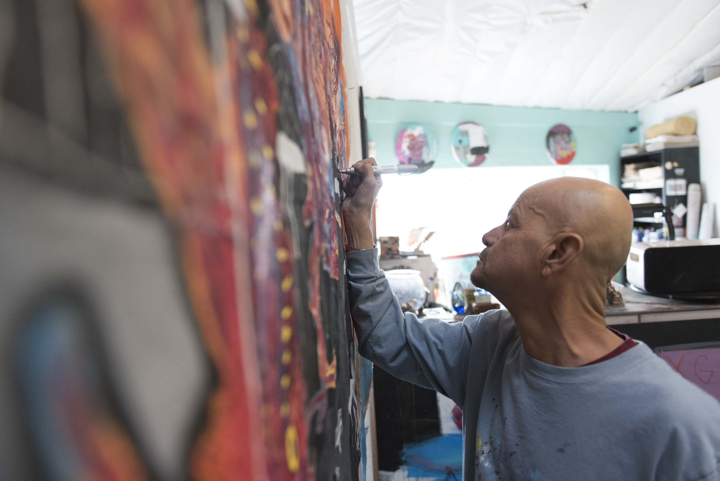 Artist, Alexander P. Huerta adds to a collaborative piece featuring work by Alexander Sky and Eddie "Cicifu" Canumay at peaceNart Studio at the Arts Factory in Las Vegas Thursday, Jan. 21, 2016. Huerta, Sky, and Canumay make up an art collective called 3 BAAAD SHEEP. Jason Ogulnik/Las Vegas Review-Journal