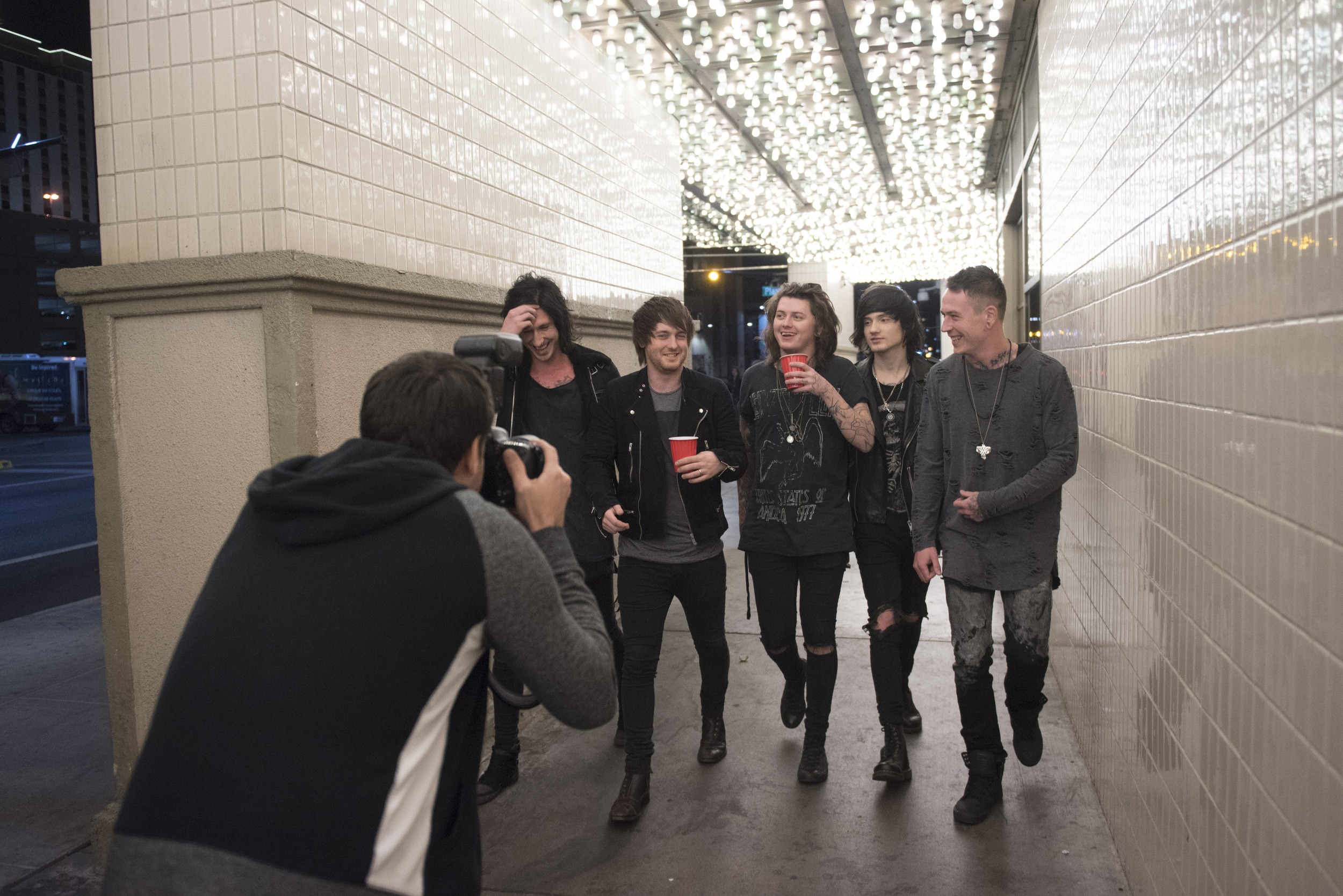 Andrew Lipovsky, left, photographs Asking Alexandria for a Kerrang! magazine photoshoot at The Plaza Hotel and Casino in Las Vegas Sunday, Feb. 7, 2016. Photo by Jason Ogulnik