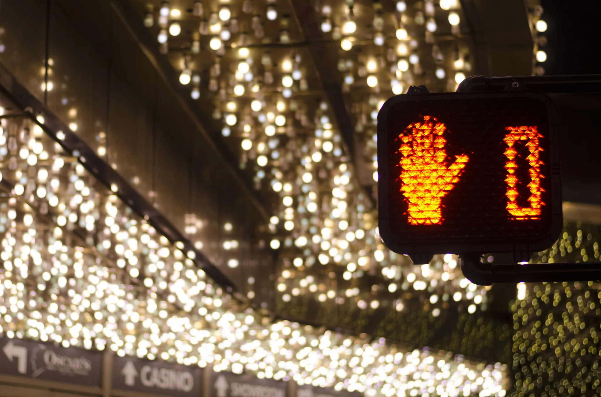 A pedestrian traffic signal counts down in front of the Plaza hotel and casino in downtown Las Vegas Wednesday, Nov. 25, 2015. 