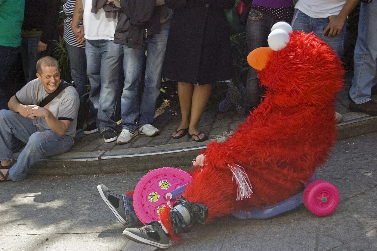 A racer rides the course down Vermont Street in an Elmo costume during the Bring Your Own Big Wheel race in San Francisco Sunday, April 12, 2009.