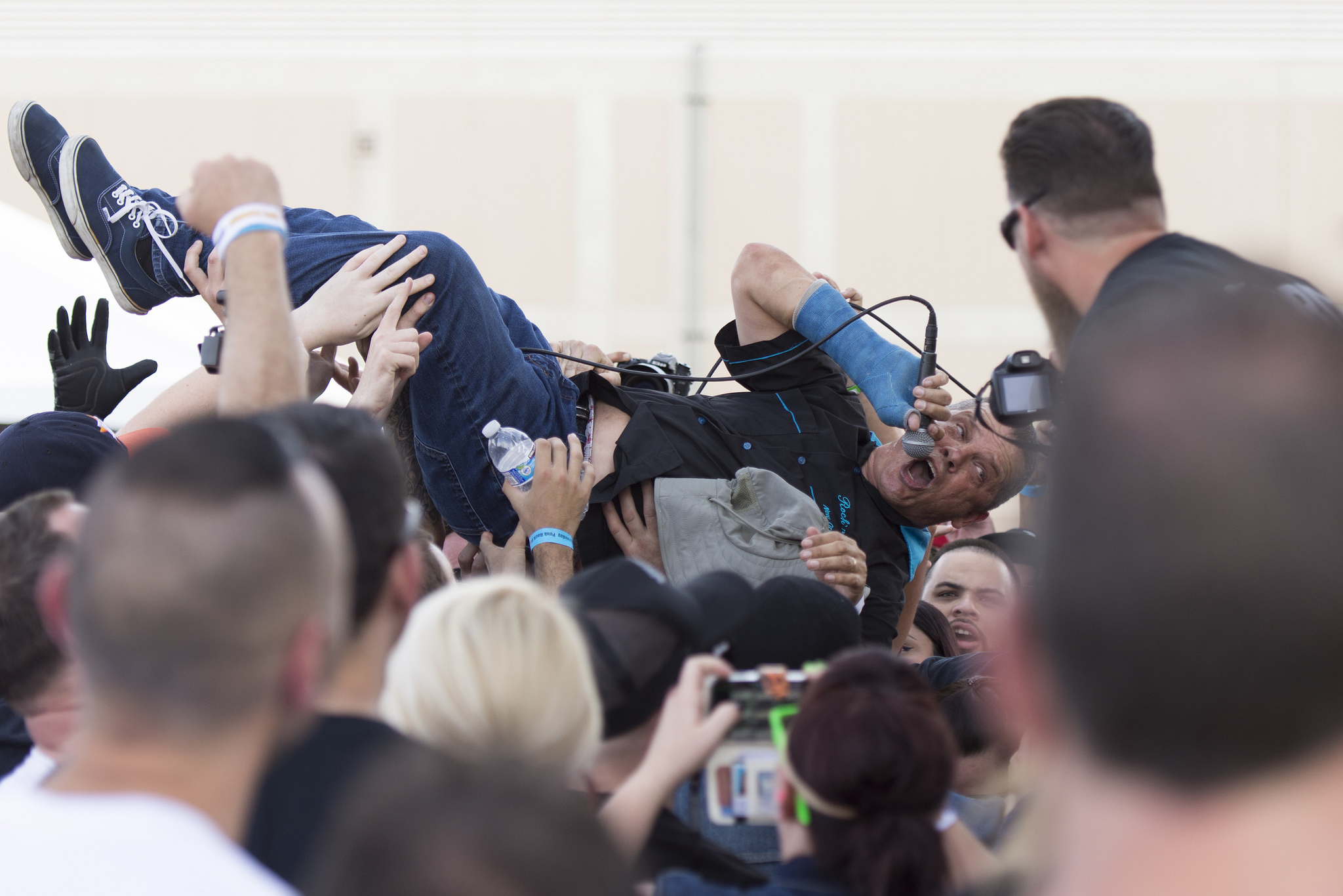 Brian Brannon crowd surfs as he performs with JFA during the 18th annual Punk Rock Bowling & Music Festival in downtown Las Vegas Saturday, May 28, 2016.