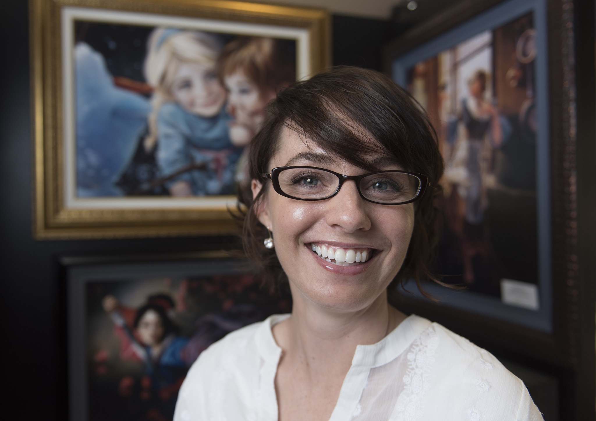 Artist Heather Theurer poses with her work in Magical Memories Featuring Disney Fine Art at Town Square in Las Vegas Monday, May 23, 2016. Jason Ogulnik/Las Vegas Review-Journal