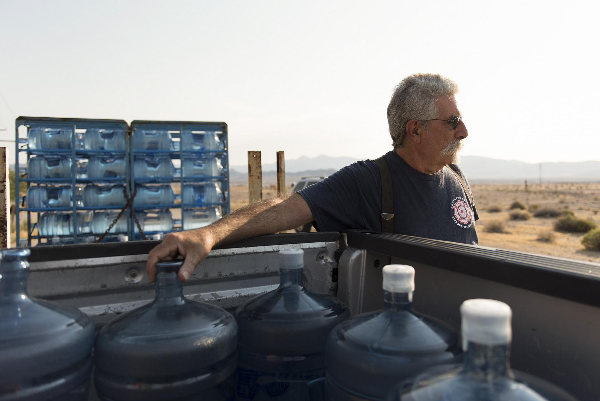 Larry Levy, fire chief with Southern Inyo Fire Protection District, makes his weekly potable water delivery rounds to residents in Tecopa, Calif. Tuesday, June 21, 2016. Jason Ogulnik/Las Vegas Review-Journal