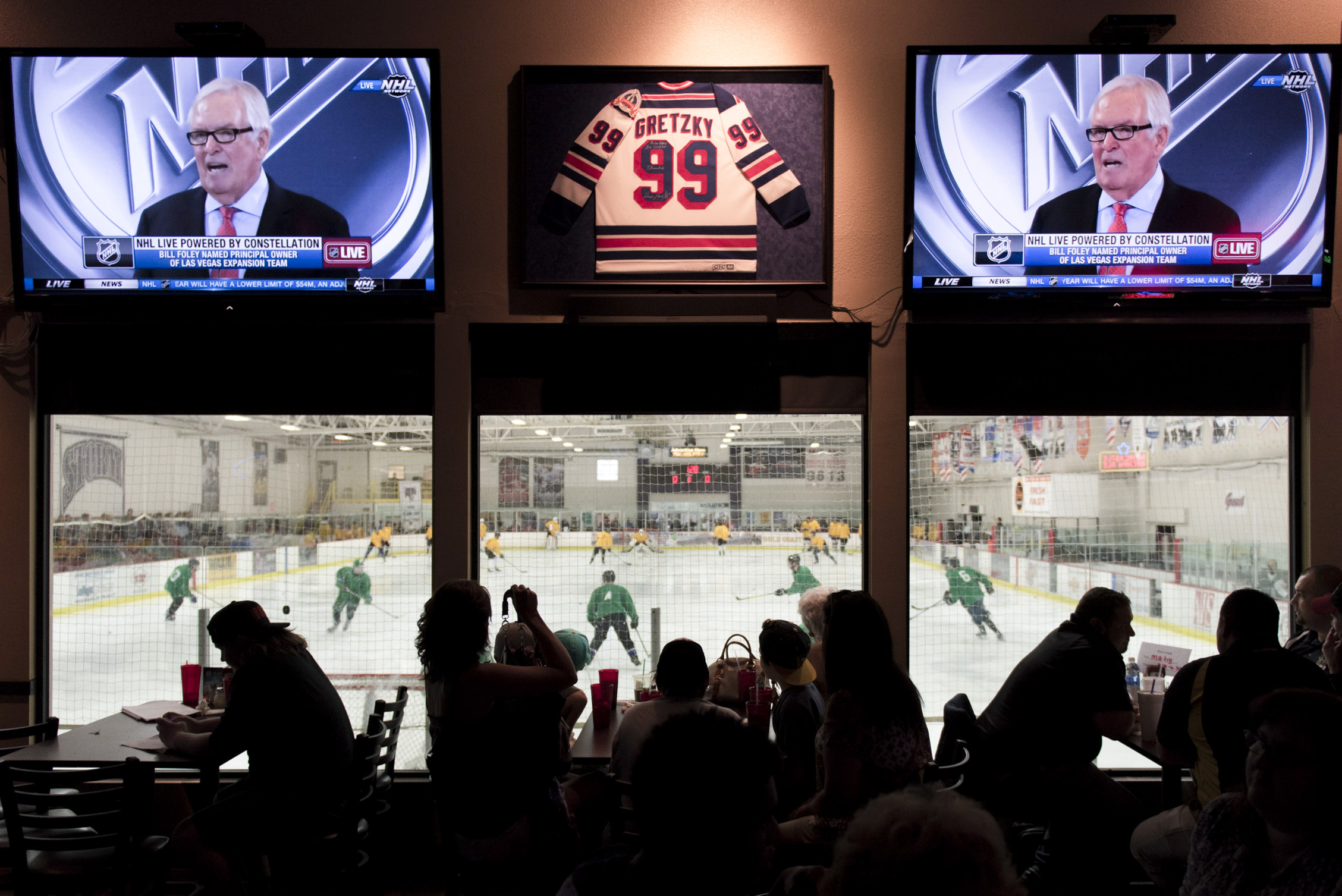 Bill Foley, principal owner of the Las Vegas NHL expansion franchise, is seen on television screens during a conference in which the NHL's Board of Governors announced approval of Foley's expansion franchise in Las Vegas at Brooksy's Bar & Grill Wednesday, June 22, 2016. Jason Ogulnik/Las Vegas Review-Journal