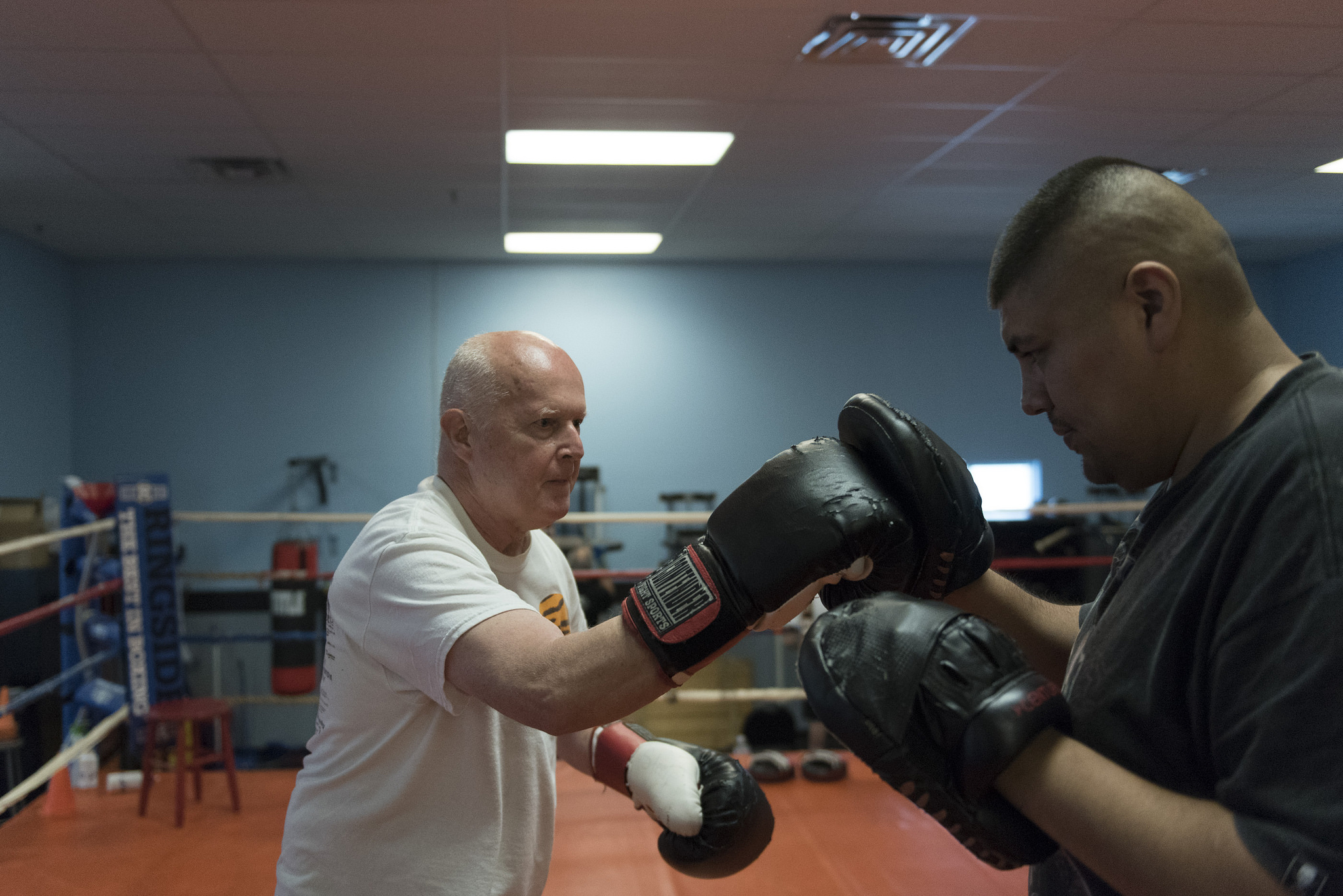 Robert Nicholson, left, does punching exercises with instructor Alvaro Morales during the Rock Steady Boxing Program at Richard Steele Boxing Club in North Las Vegas Monday, June 20, 2016. The therapy helps to slow the effects of Parkinson's disease. Jason Ogulnik/Las Vegas Review-Journal