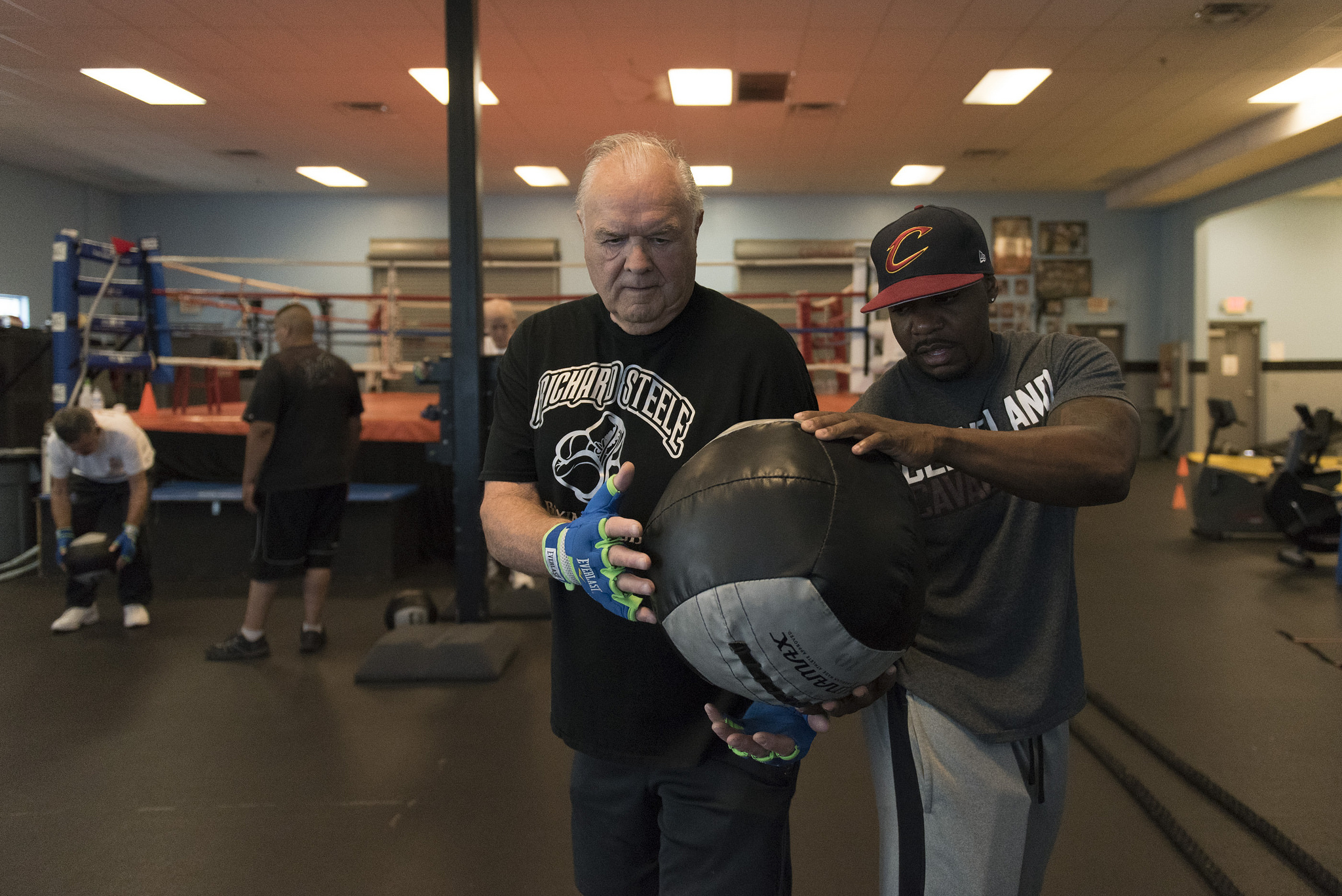 Instructor Donche King, right, and Jerry Sloan do ball exercises during the Rock Steady Boxing Program at Richard Steele Boxing Club in North Las Vegas Monday, June 20, 2016. The therapy helps to slow the effects of Parkinson's disease. Jason Ogulnik/Las Vegas Review-Journal
