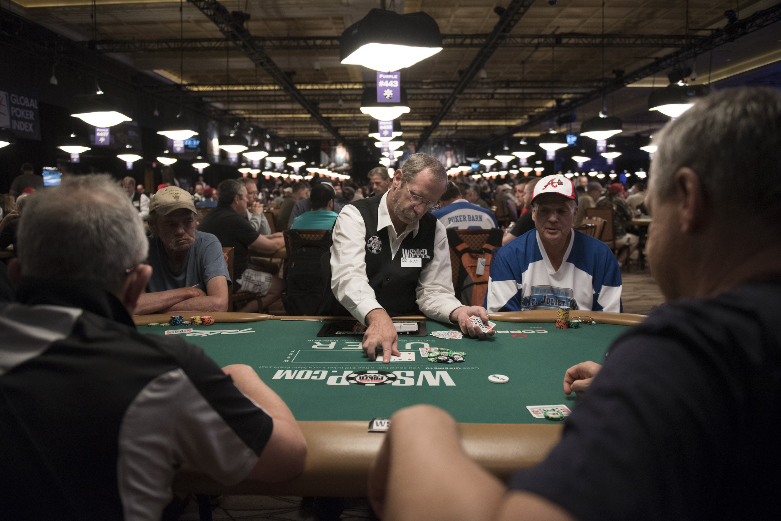 Ray Knee, center, deals during Day 1A of the Main Event of the World Series of Poker at the Rio Convention Center in Las Vegas Saturday, July 9, 2016. Jason Ogulnik/Las Vegas Review-Journal