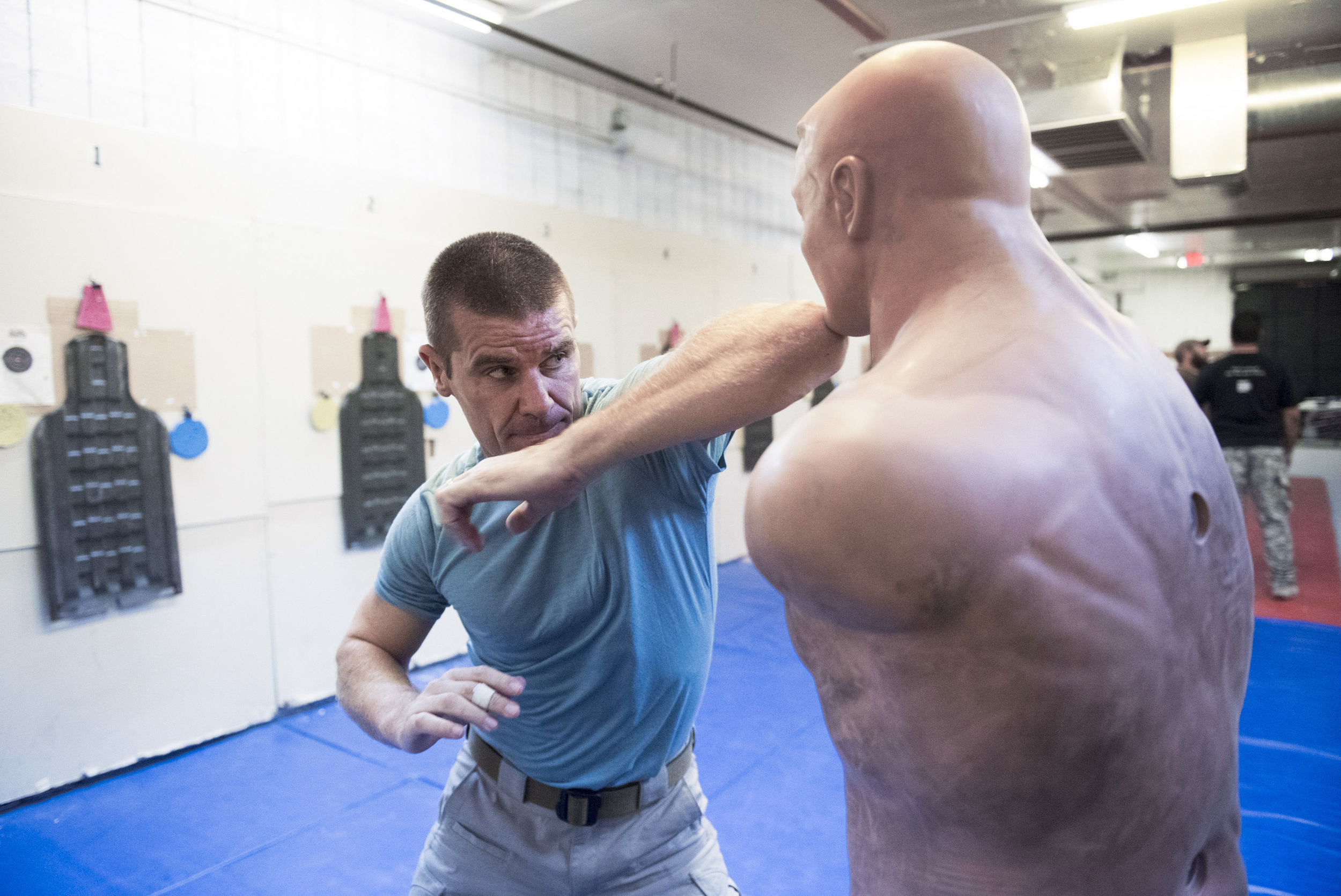 John Ivens demonstrates hand to hand combat techniques during the bodyguards adventure course at Vegas Tactical Adventures in North Las Vegas Tuesday, Aug. 18, 2015. (Jason Ogulnik/Las Vegas Review-Journal)