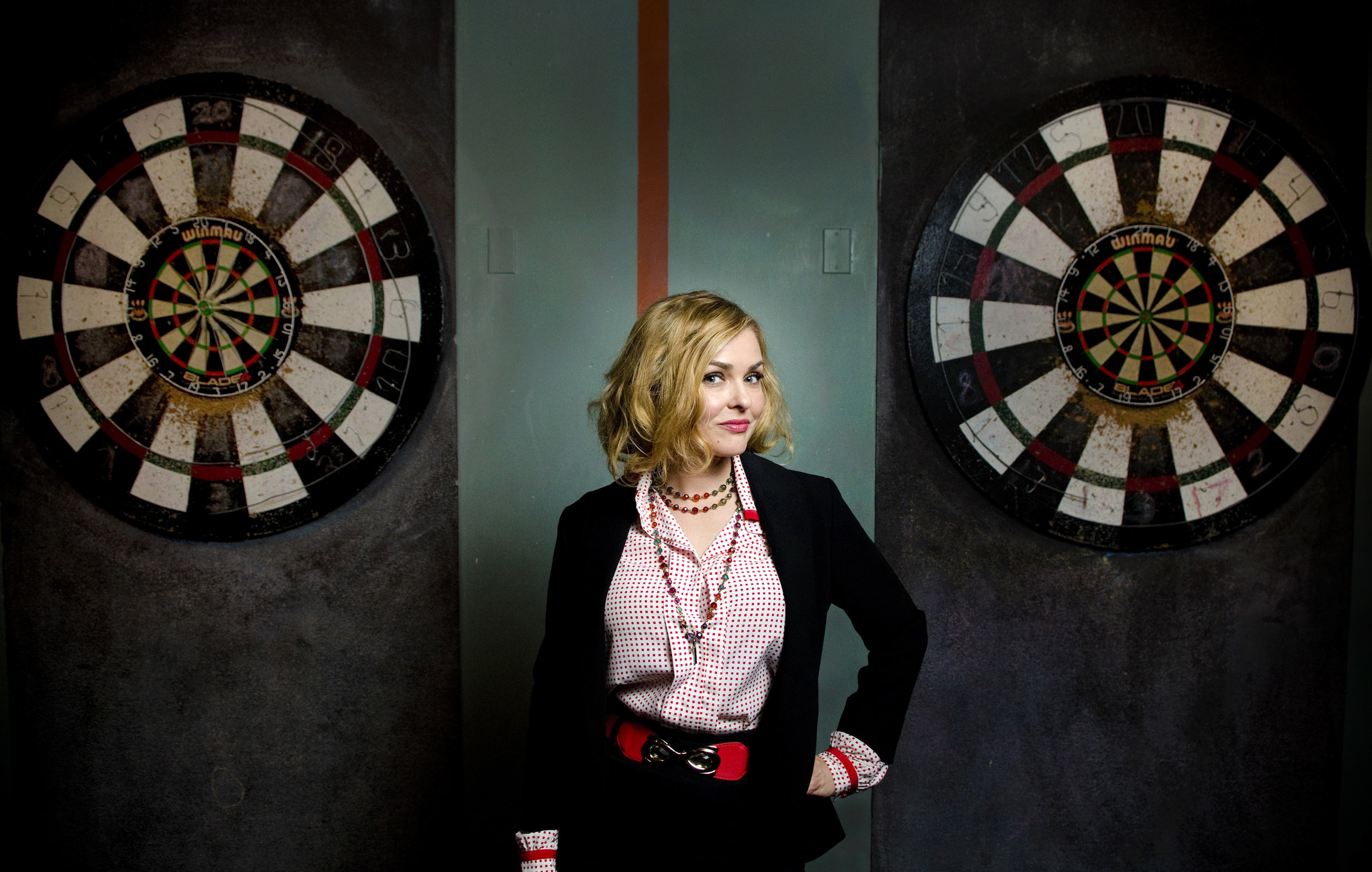 Actor and 1992 Playboy Playmate of the Year Corinna Harney of the interactive comedy show Alibi poses during a cast portrait session at Gold Spike in Las Vegas, Saturday, March 7, 2015.