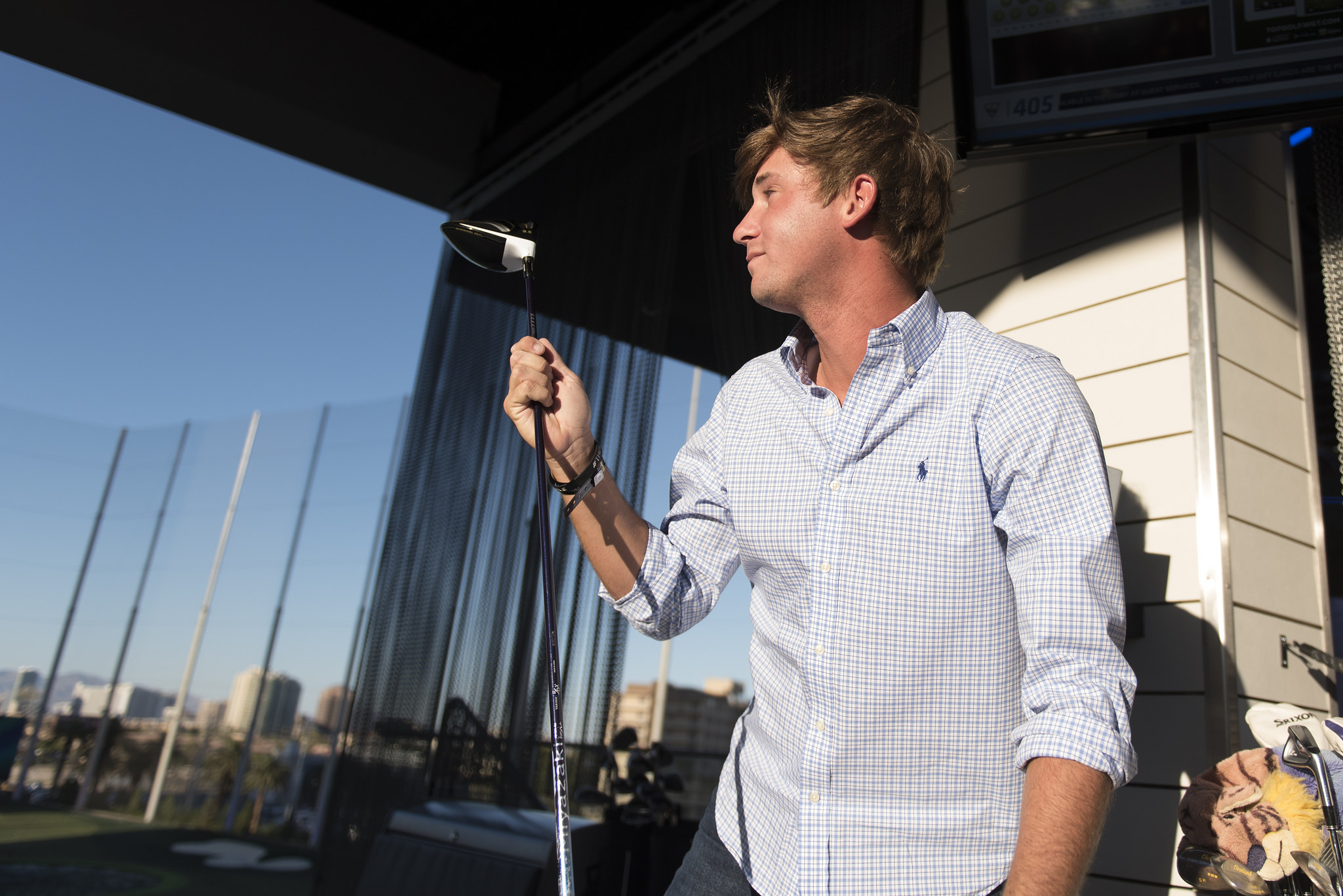 Shriners Hospitals for Children Open defending champion Smylie Kaufman changes clubs in-between hitting golf balls at Topgolf's driving range during a media day for the tournament in Las Vegas, Monday, Sept. 26, 2016. The tournament takes place October 31- November 6 at TPC Summerlin. Jason Ogulnik/Las Vegas Review-Journal