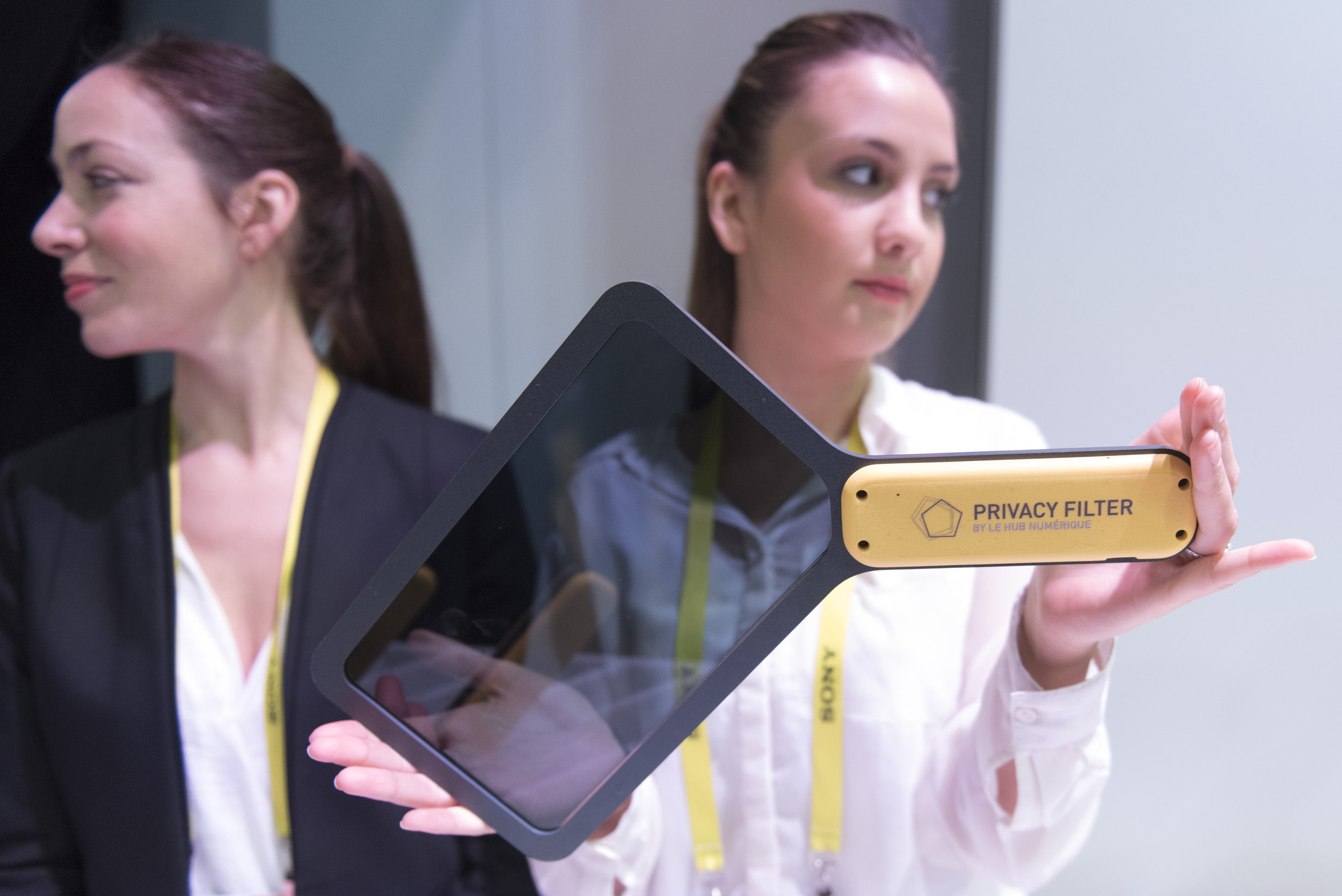 A woman demonstrates a privacy filter at the La Poste booth at the International Consumer Electronics Show (CES) in Las Vegas, Nevada, USA, on January 06, 2017. Jason Ogulnik/Sipa Press