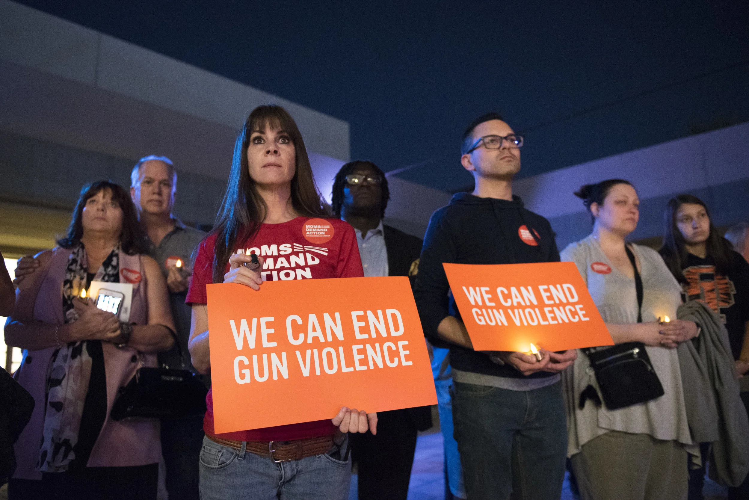 At the East Las Vegas Community Center, Lisa Bailey, third from left, and other attendees listen as Nev. Sen. Pat Spearman, D-North Las Vegas, speaks during a vigil to commemorate the victims of the Route 91 Harvest Country Music Festival mass shooting.