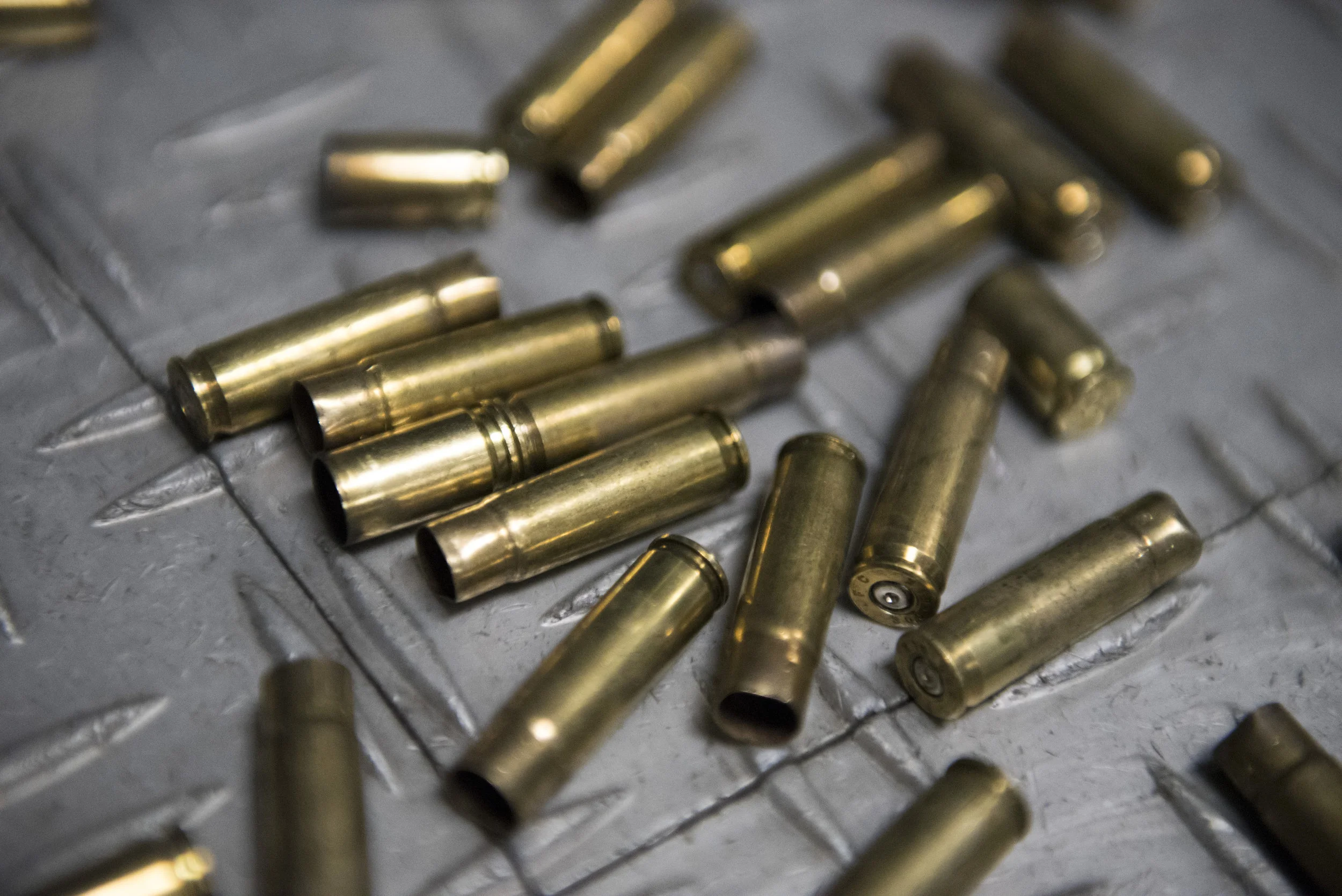 Bullet casings are scattered across the floor at Green Valley Range in Henderson, Nev..