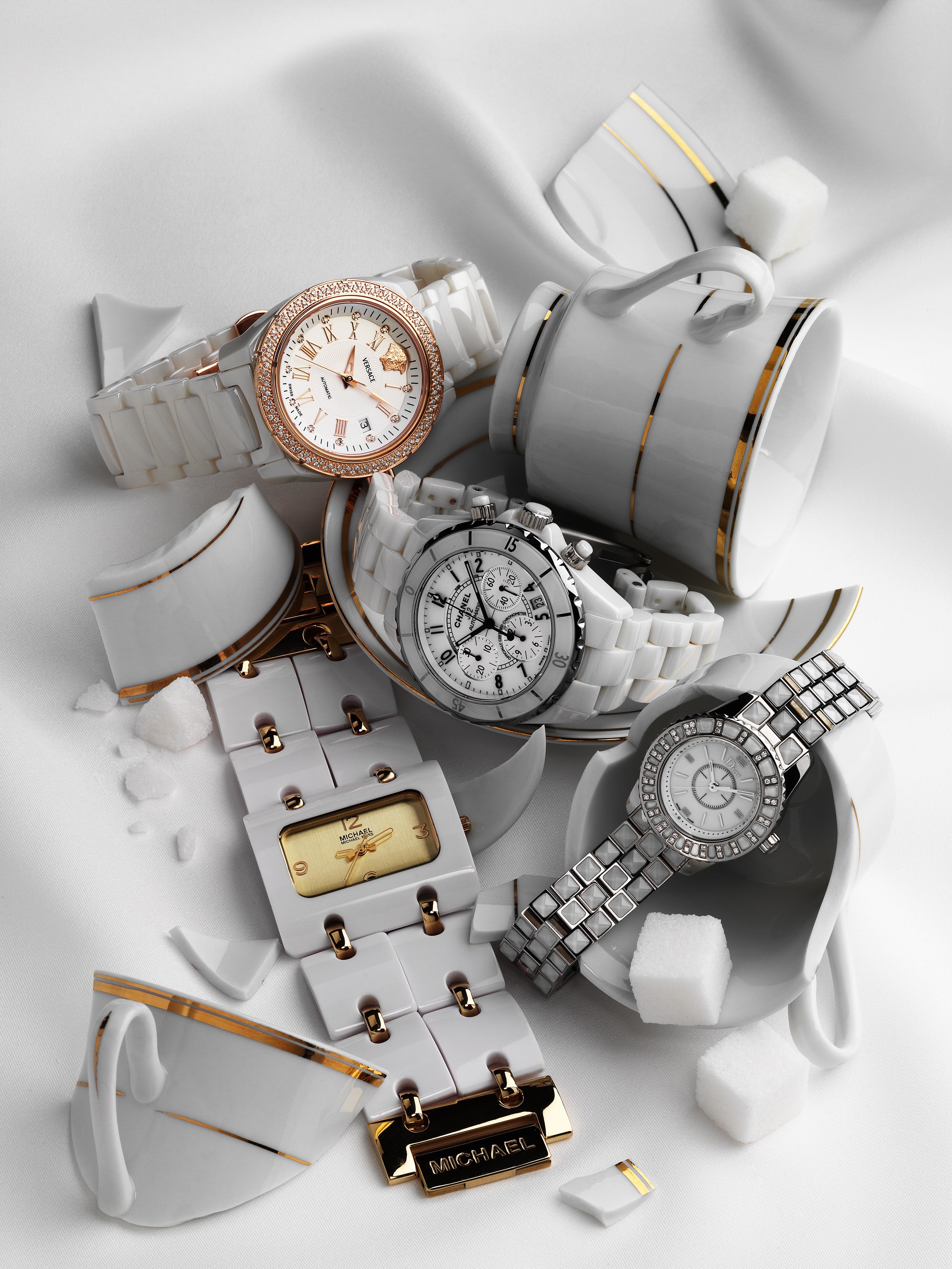 Beautiful still-life of Watches with broken cup and saucer for Bazzar Magazine