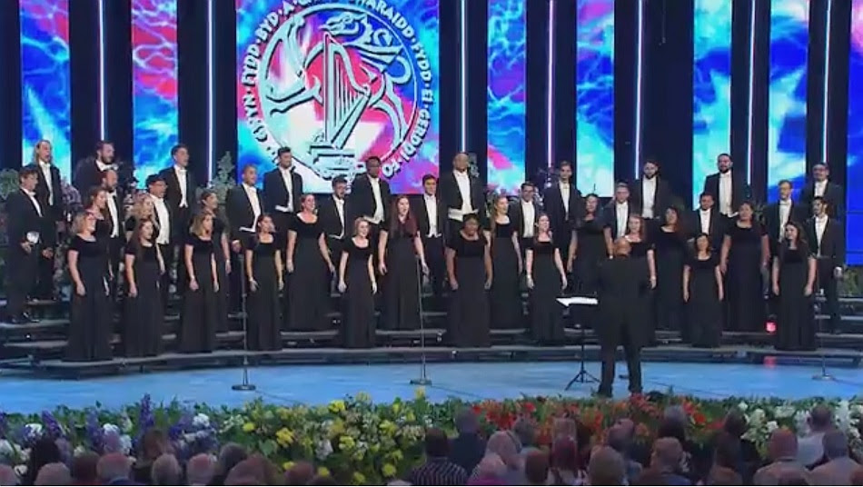 Chamber Choir of CSU Long Beach, performing in Wales, where they won the 2016 Choir of the World Award. This choir is to record the works of the Choral Tales Project.