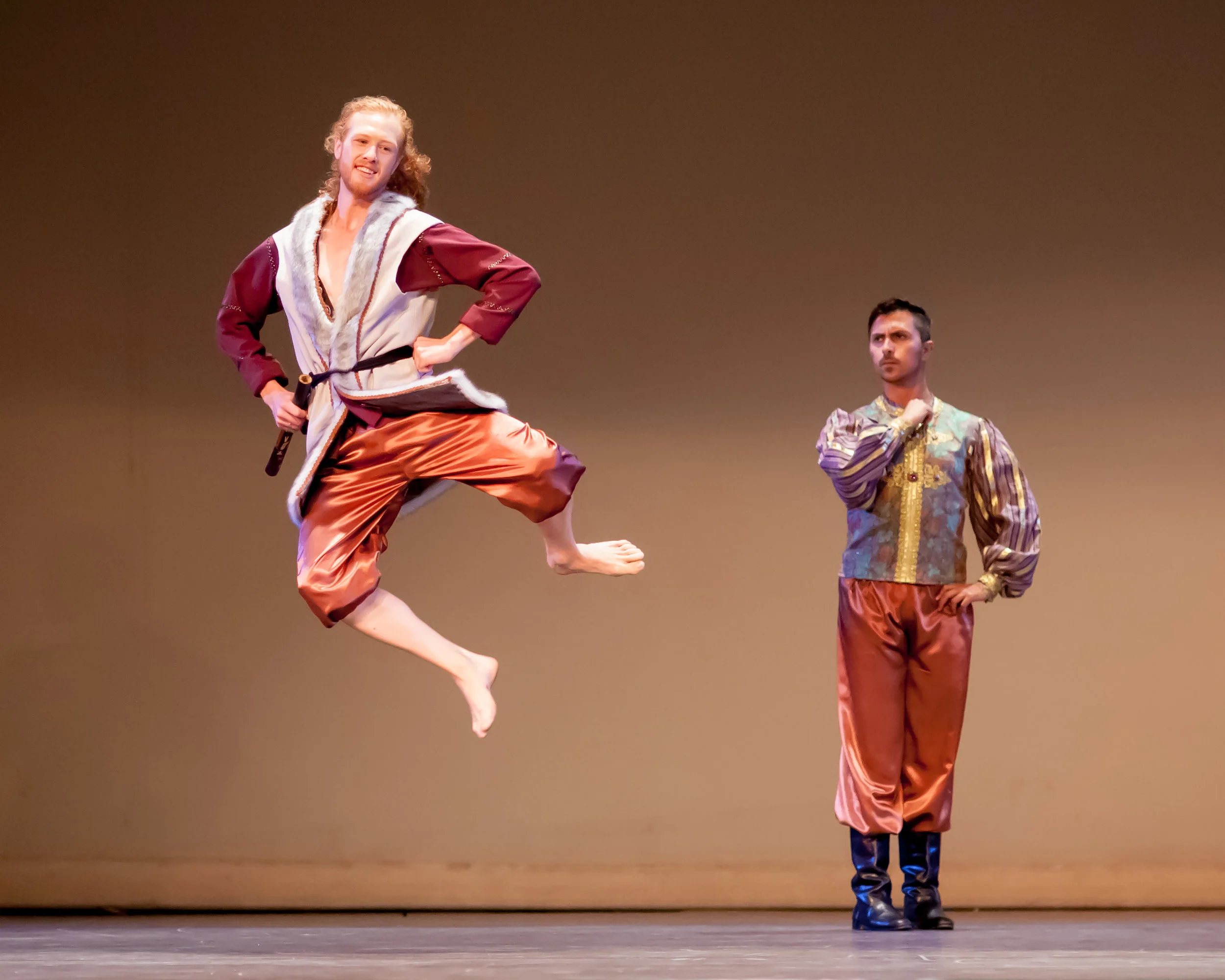 Sherene Melania, Artistic Director of the Presidio Dance Theatre in San Francisco, choreographed "The Happy Man's Shirt". Seen above are Andrew Leathers as the Happy Man, and Edgar Lepe as the King. Filmed last year, this dance has now been combined with the filming of the choir singing the music.