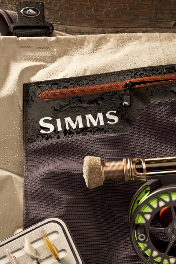 Simms fly-fishing waders and Cabela's fly-fishing reel.