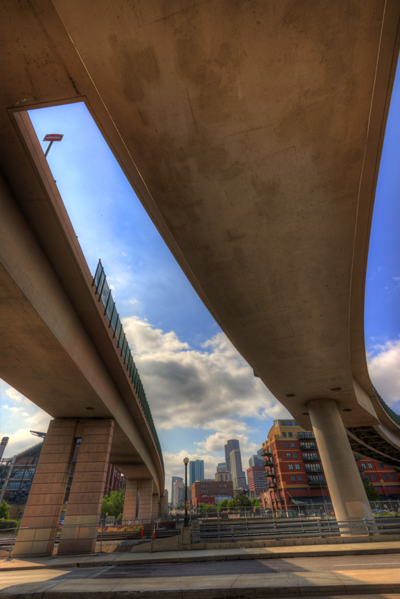 Bridge underpass and Denver skyline. 