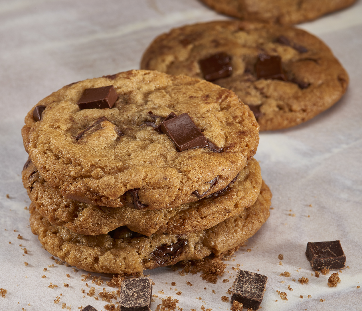 Stacked chocolate chip cookies. 